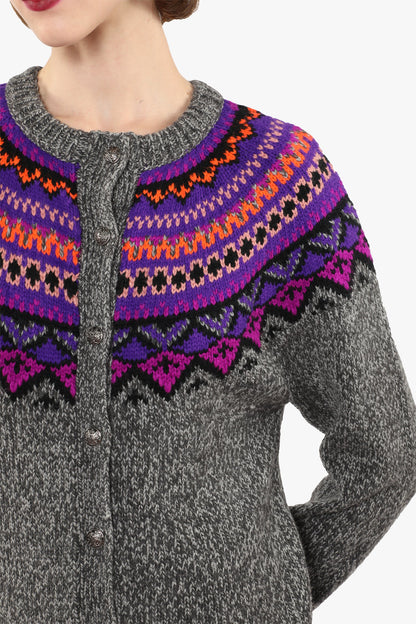 Fair Isle Cardigan, magenta, neckline collar, pattern hue of green and blue triangles, 8-buttons.