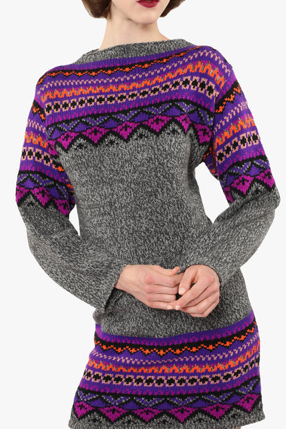Fair Isle Sweater – Magenta, neckline collar, gray with top pattern of magenta and purples triangles.