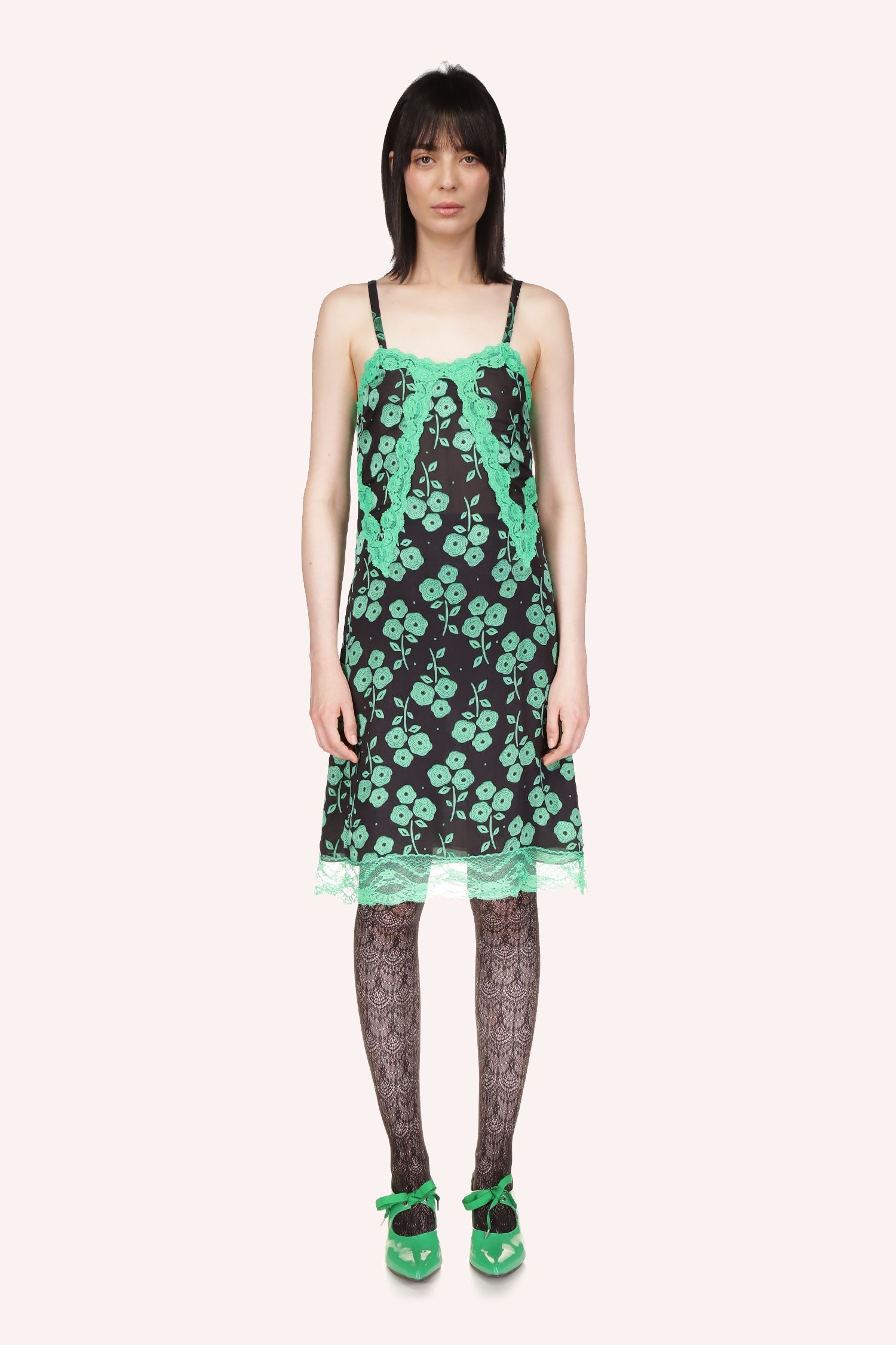 Anna Sui's Stitched Poppies Dress, verdant petals on a black base, sleeveless, 2-straps, knees-long, green lace at the bottom