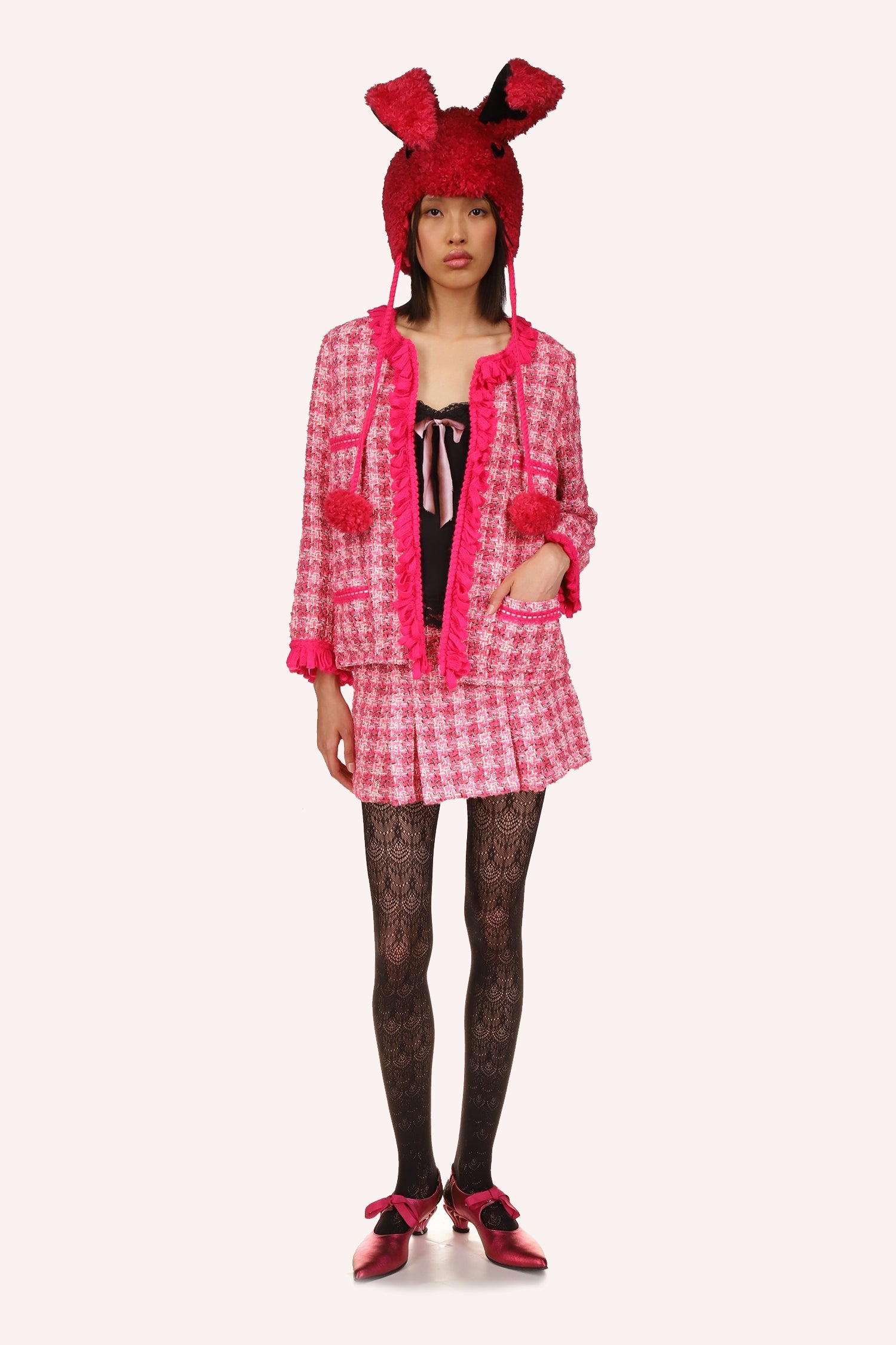 The Anna Sui’s Ribbon Chenille Tweed Jacket Bubblegum Pink Multi is a hip-length jacket in a soft pink shade