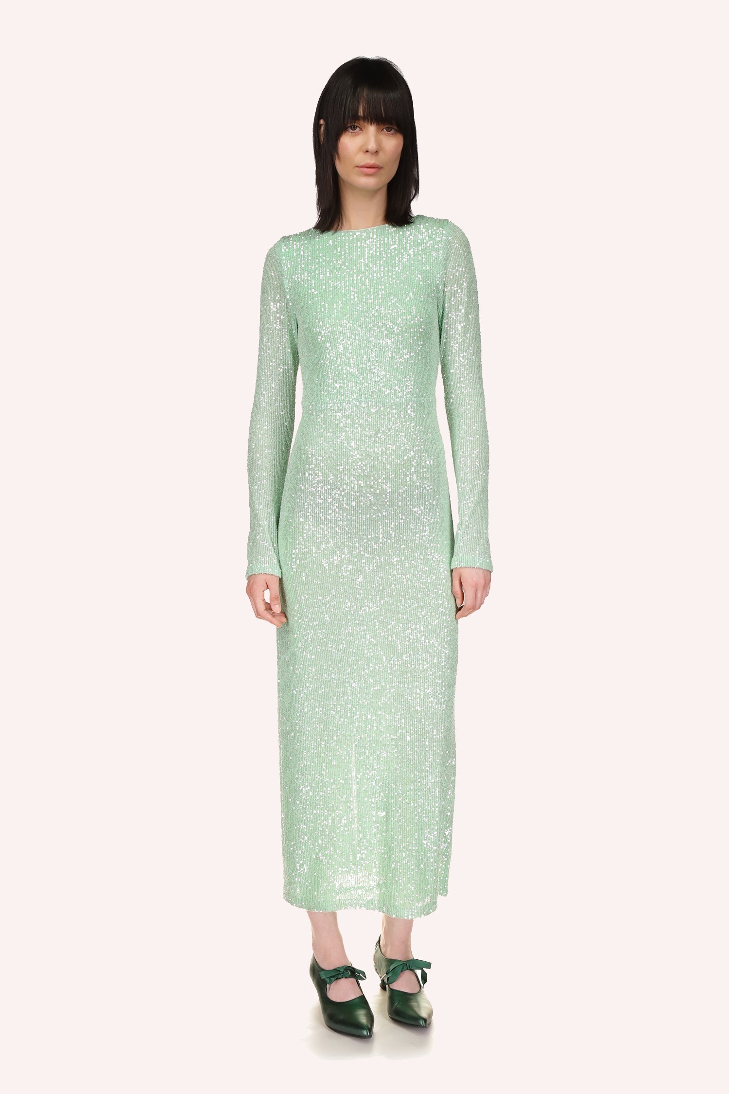 The Sequin Mesh Dress Peppermint, designed by Anna Sui, is a sophisticated gown 