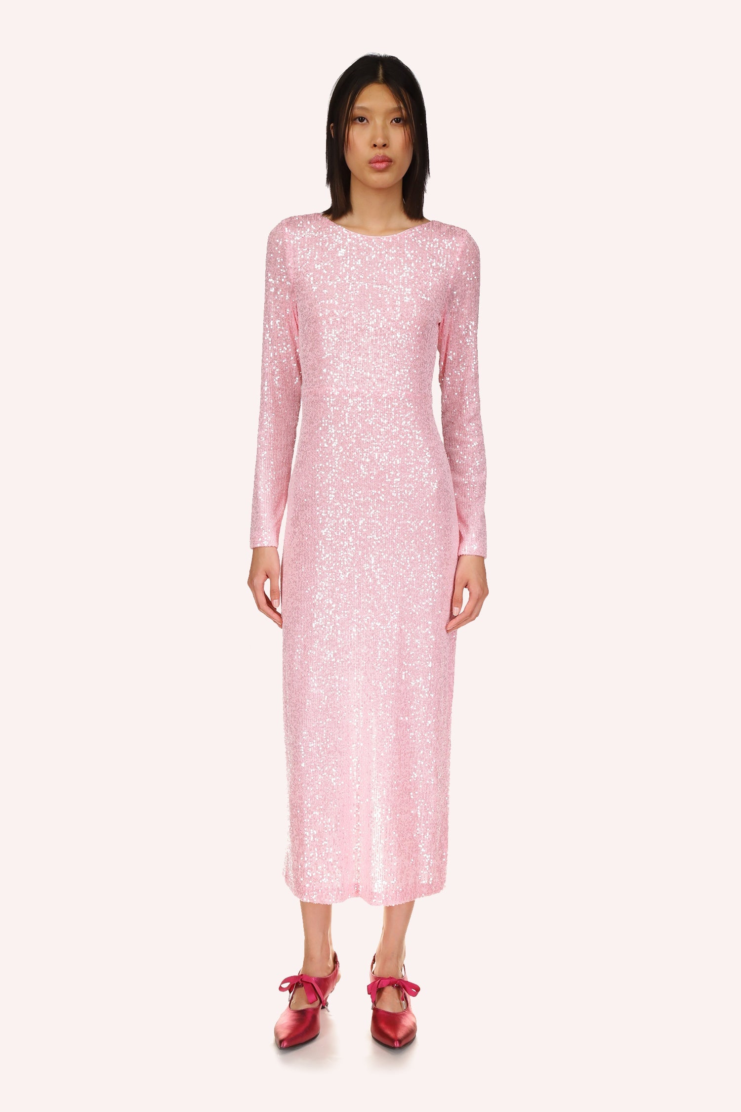 Anna Sui's Sequin Mesh Dress, soft baby pink, long sleeves and a collar frames the neckline