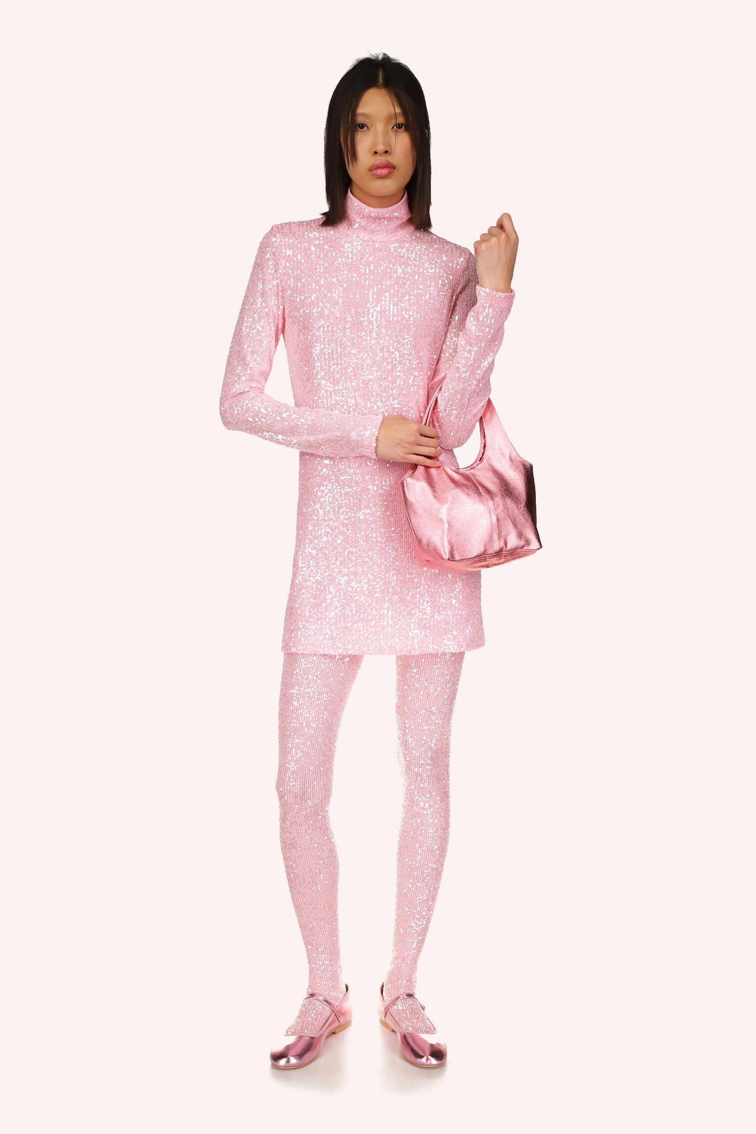 Turtleneck Dress Baby Pink, by Anna Sui, is an elegant and refined look in a delicate baby pink