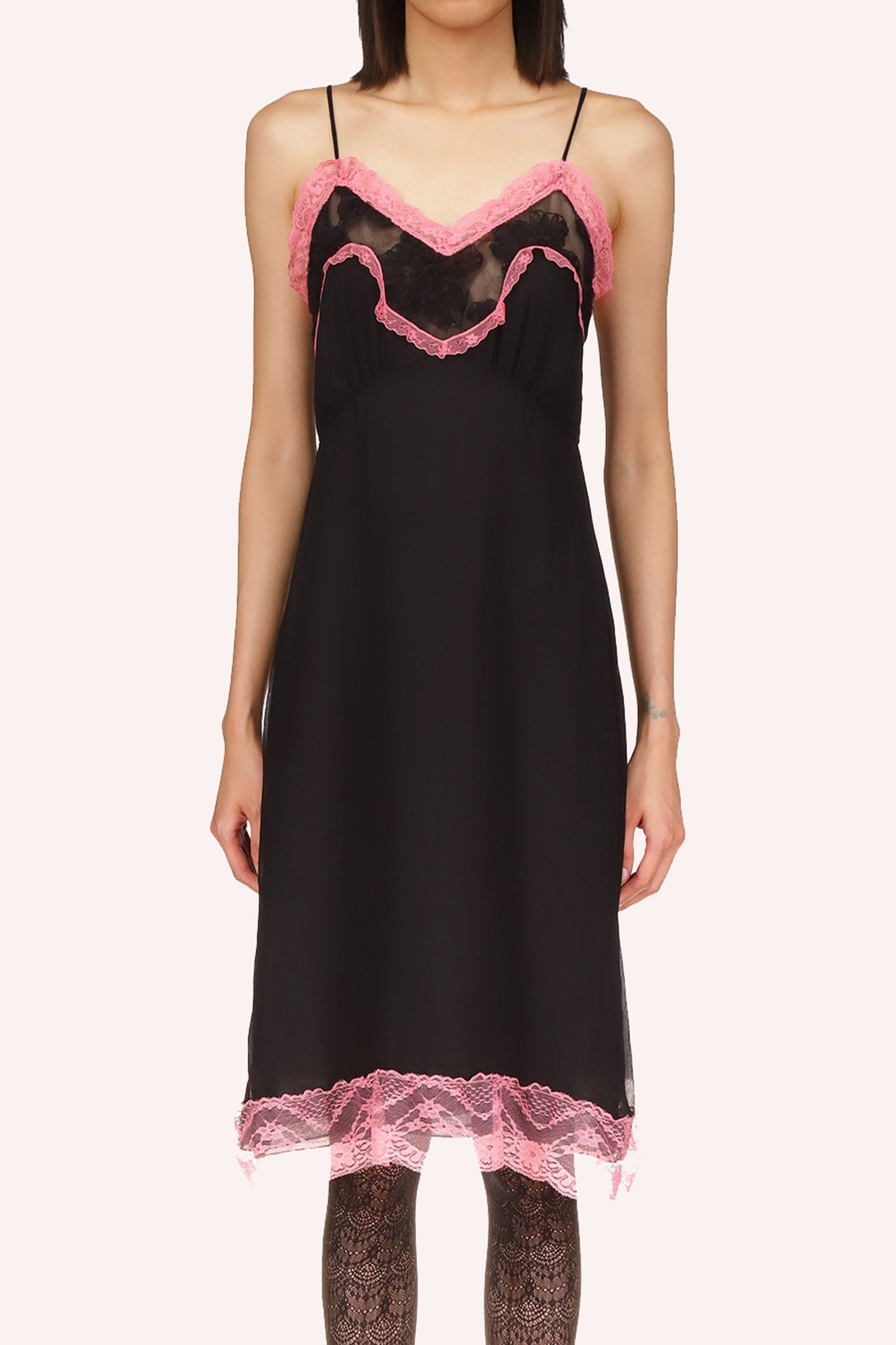 Black dress, a black floral see-through between the pink highlights, sleeveless, 2 straps, knee-long