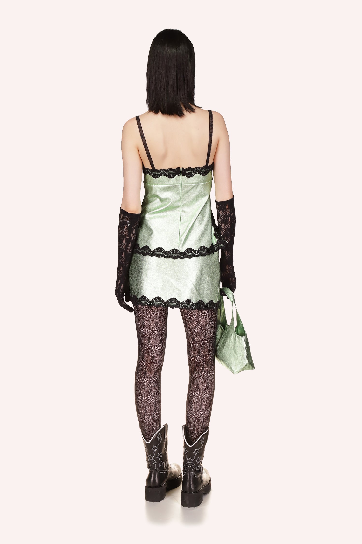 Camisole Top Peppermint, sleeveless, black straps on shoulders, black lace around the top and bottom, zipper on back