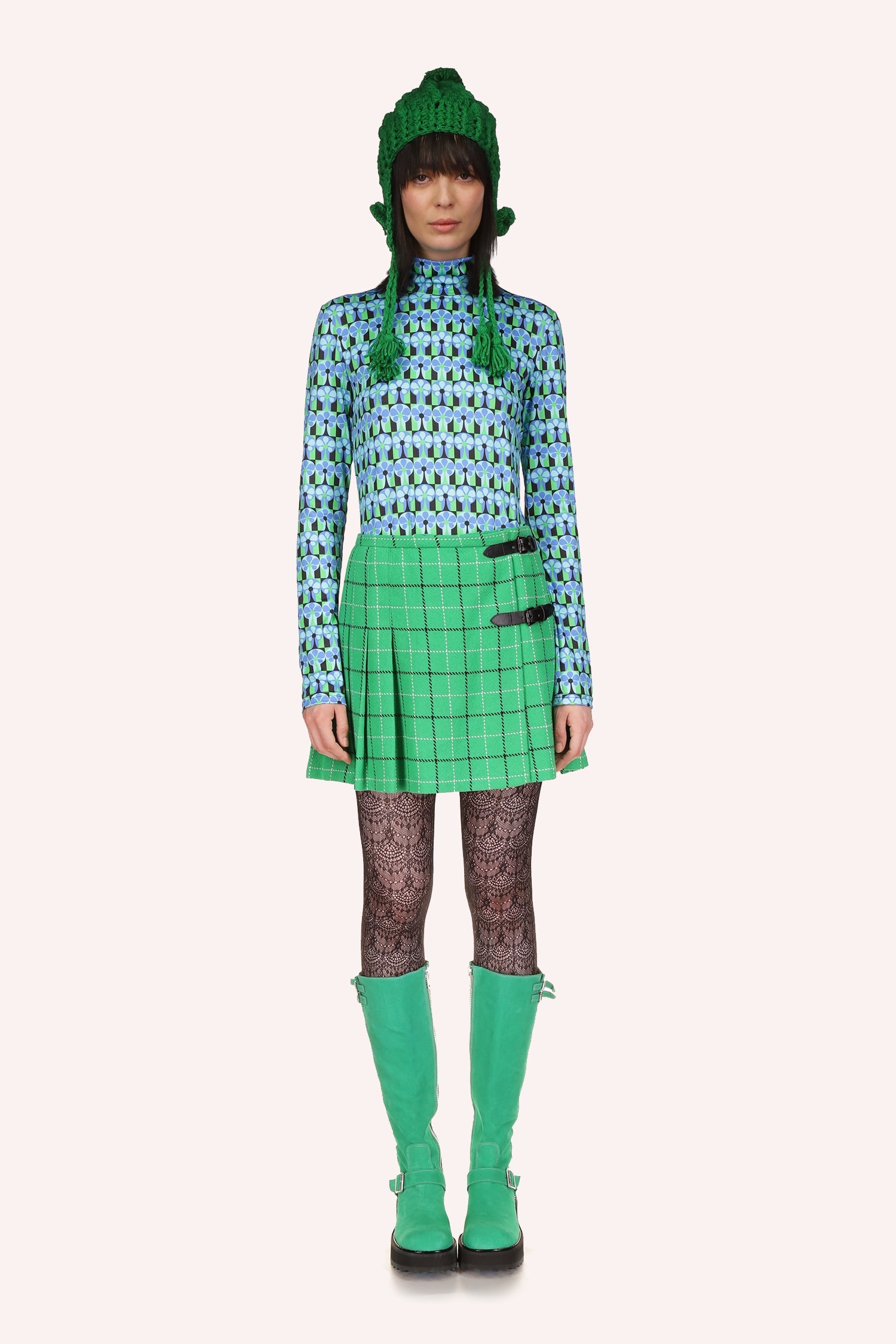 Anna Sui Turtleneck, long sleeves, horizontal pattern of round light green and blue florals and dark green background