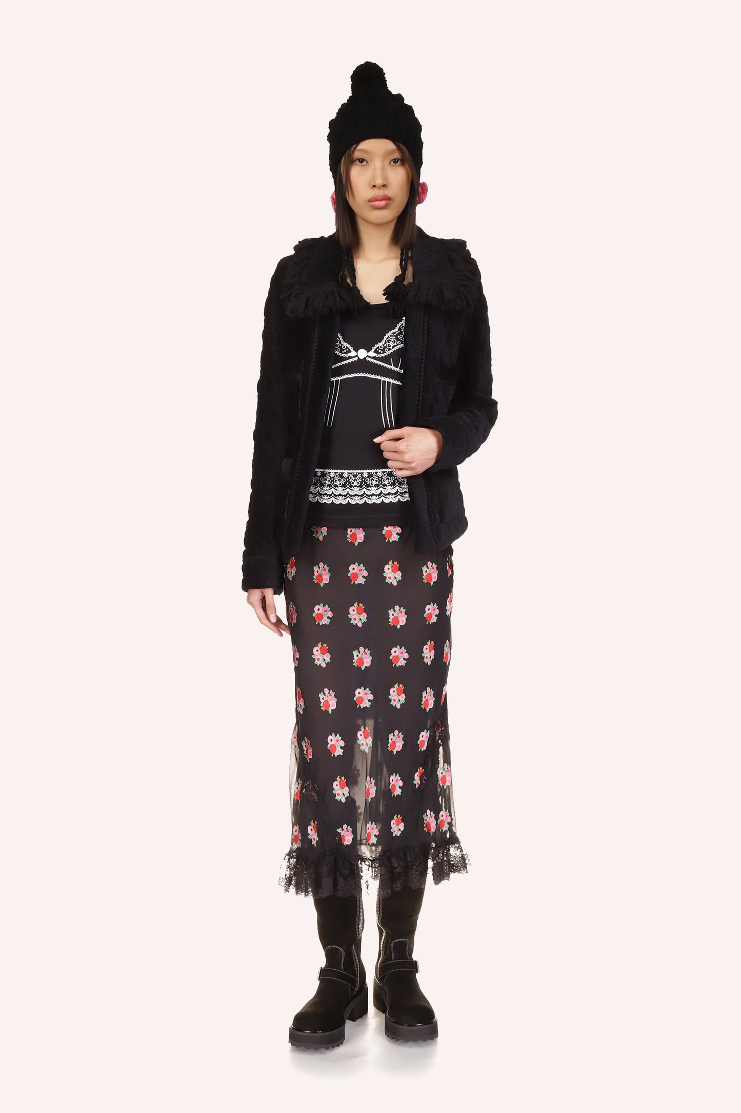 The Anna Sui Quilted Daisies Jacket in Black is a stunning, long-sleeved jacket