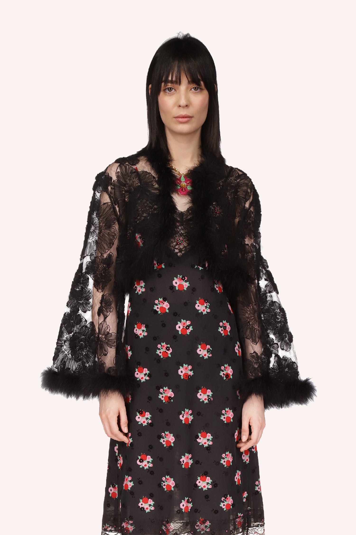 Sheer fabric, large black flowers, fur at borders, Jacket is under breast length