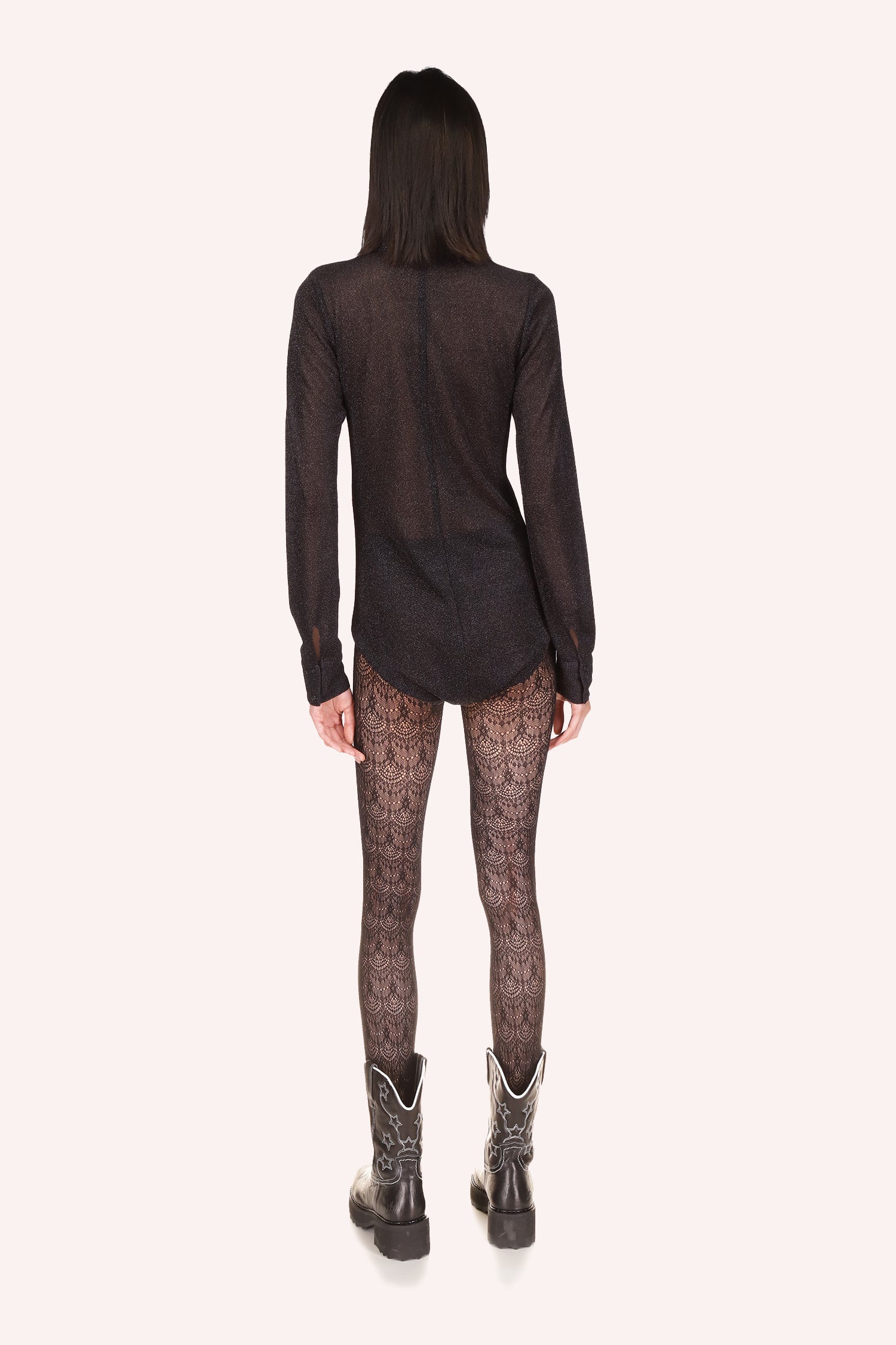 Black see-through material shoulders to hips, long sleeves, black zipper on the back