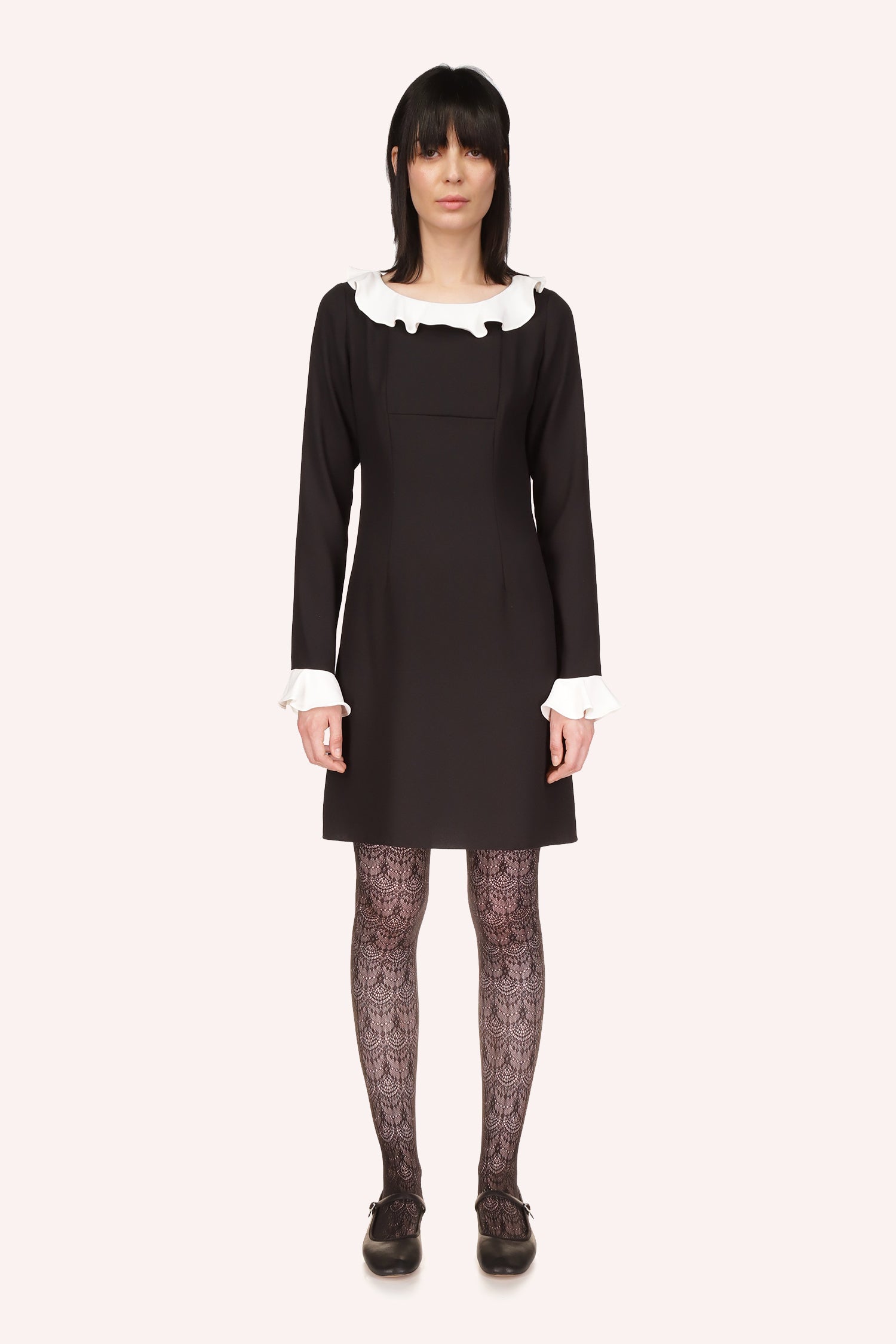 Combo Crepe Dress is above-the-knee dress, with the vanilla crepe on the long sleeves and collar borders
