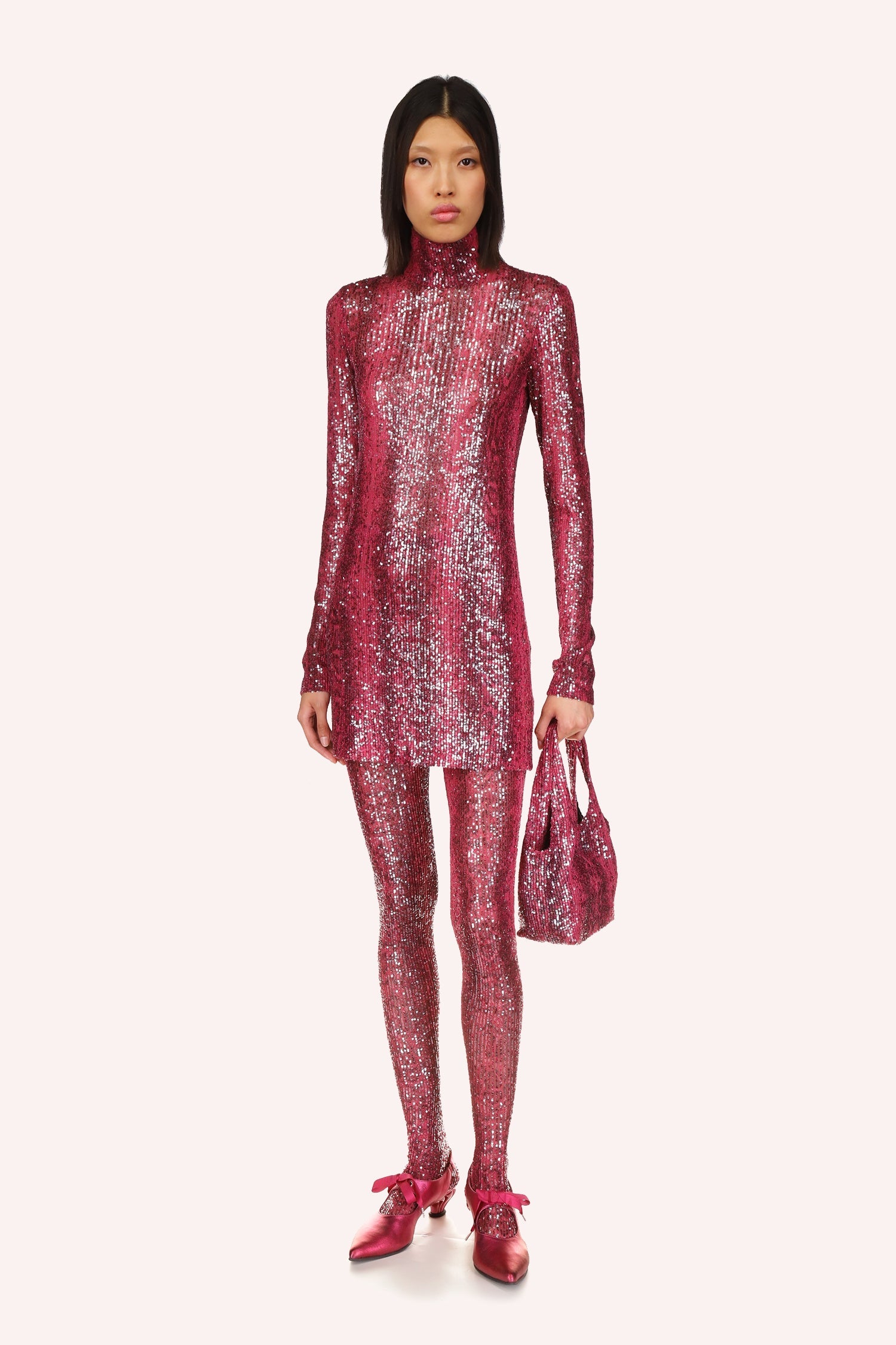 The Snakeskin Sequin Turtleneck Dress Ruby Multi is mini, shiny ruby red color, long sleeves, and turtle neck collar