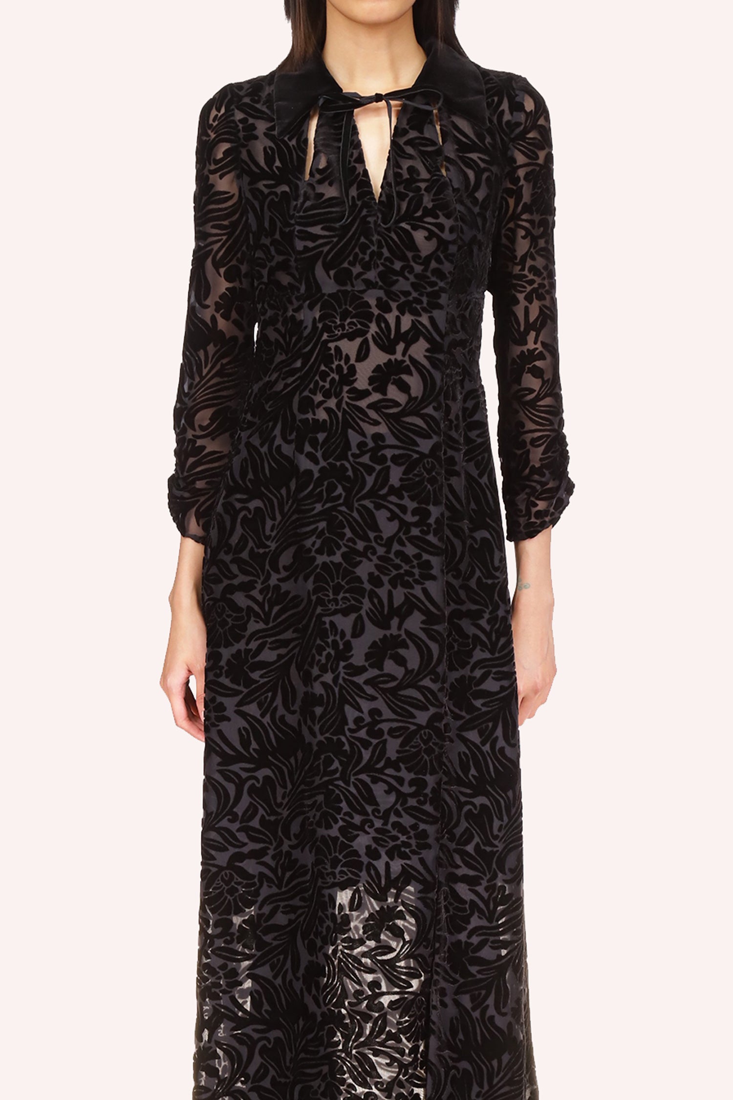See-thru Floral-patter, V-cut lace collar, two small slits on the bust, and lace-adorned long sleeves
