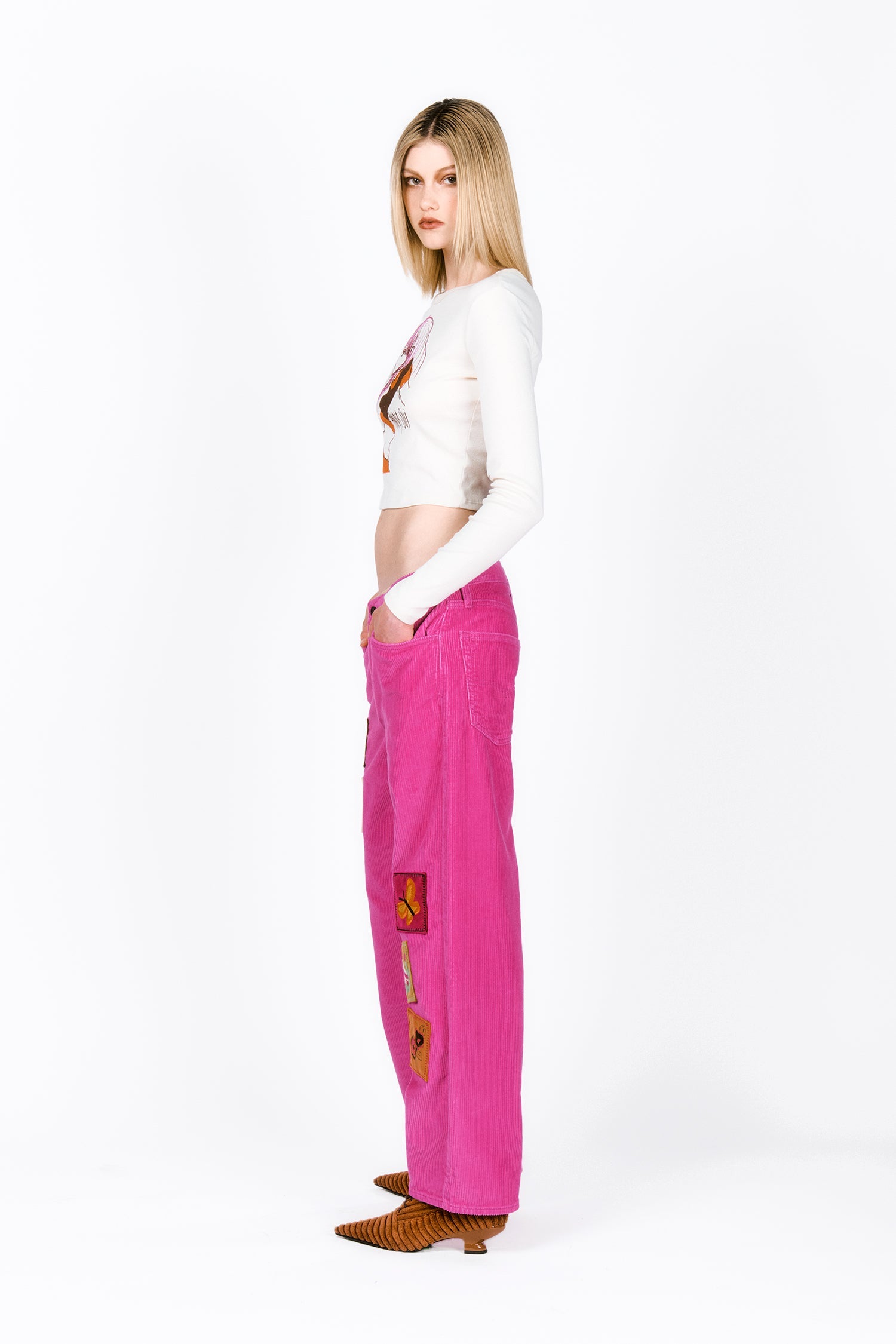 Embroidered Velveteen, pink pans, large stiches on the side of legs, back pocket