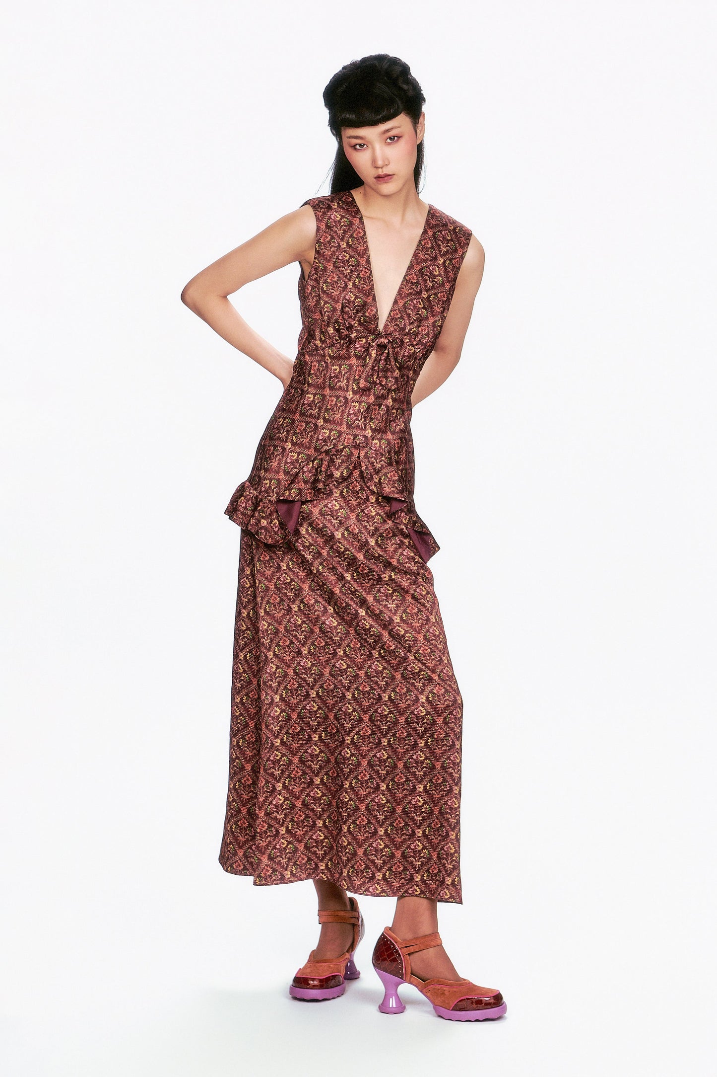 Woman wearing a Wallpaper Medley Maxi Dress vintage style with ruffled details easy to wear.