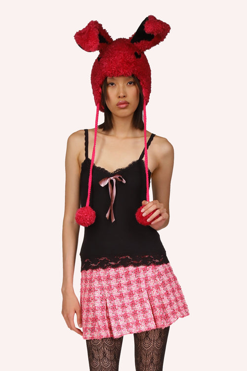 The Anna Sui Lingerie Deco Tank in Rose is a sleeveless black tank top with a black lace border at the top and bottom