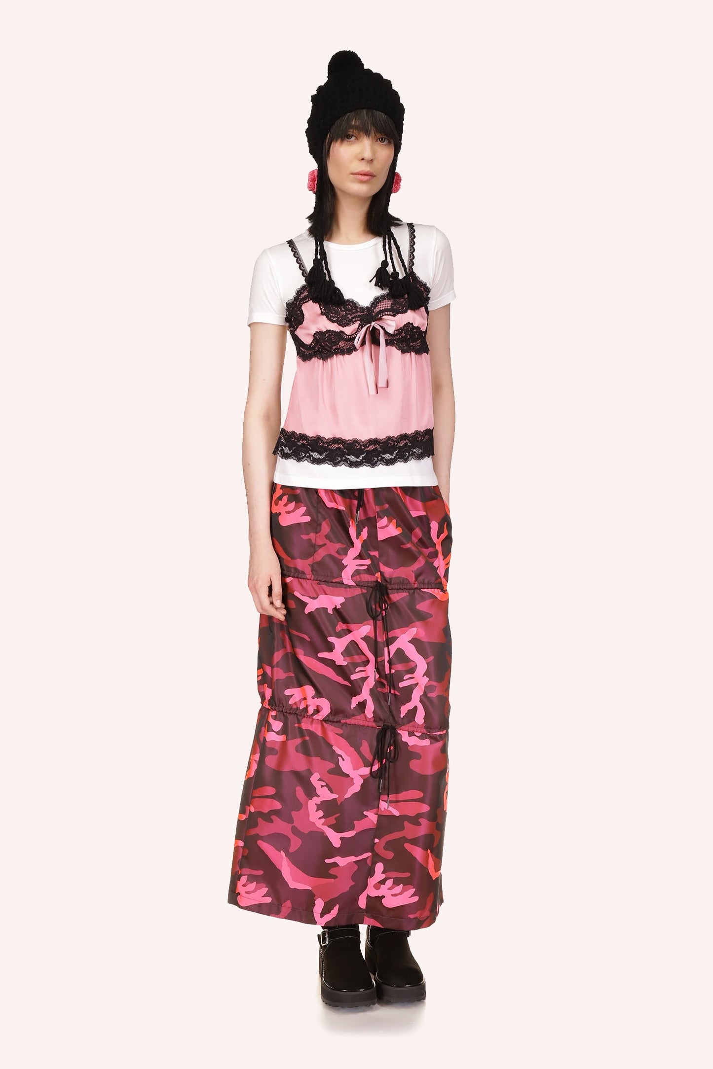 The Skirt Hot Pink Multi, is a camouflage-style pattern with varying shades of dark pink