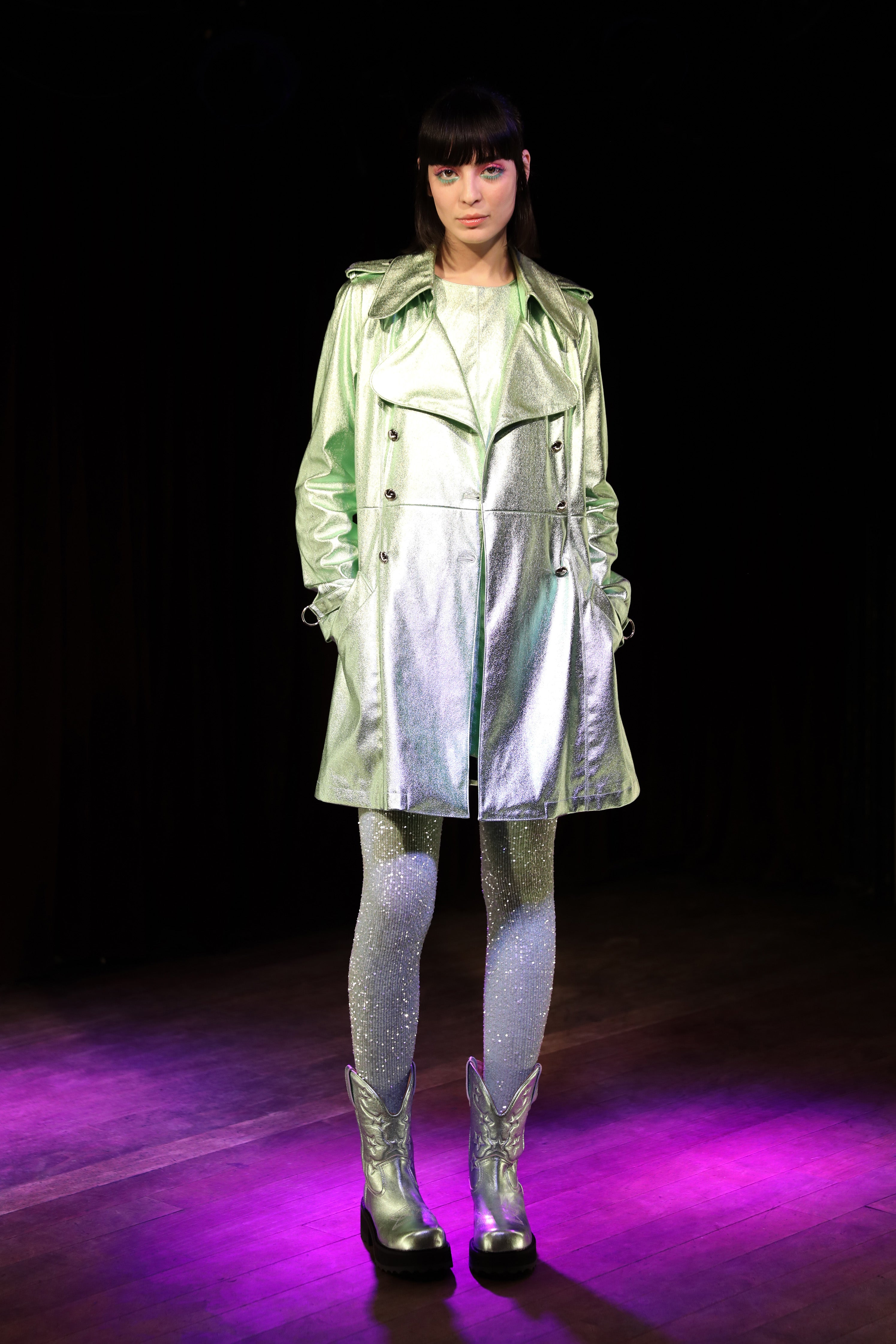 Runway style for this Peppermint Metallic Coat is a mid-length coat with a large collar and long sleeves with buckle cuffs