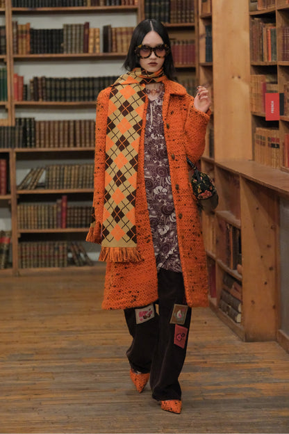 In a library, Embroidered Velveteen Patched Corduroys, brown pans, with fall attire