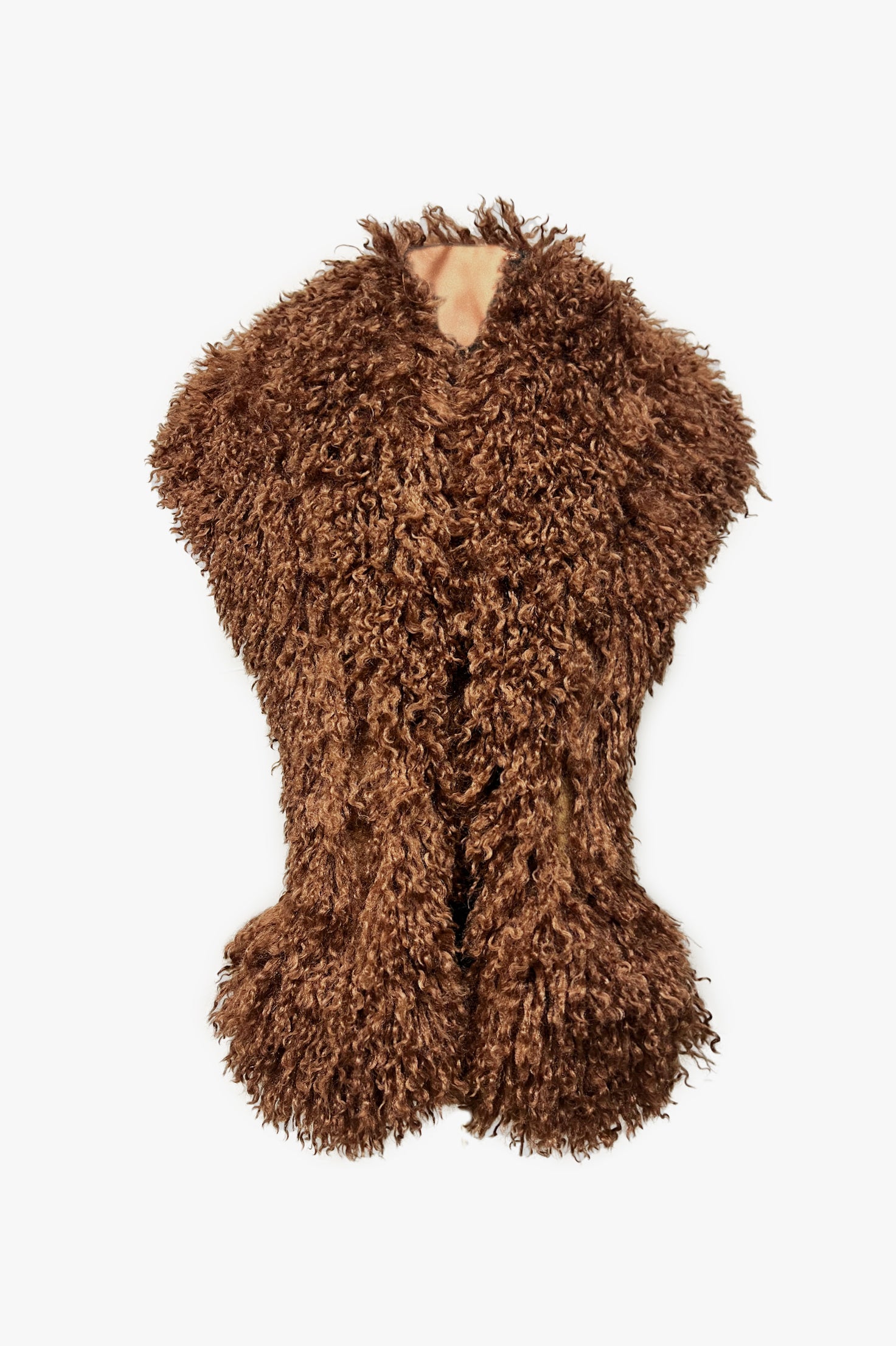 Luxuriously soft and cruelty-free Caramel Faux Fur Shawl adds instant glamour to any outfit.