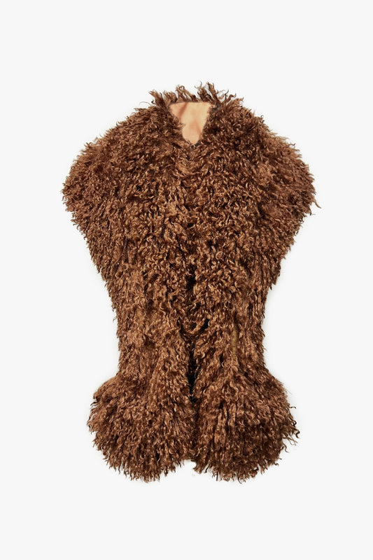Luxuriously soft and cruelty-free Caramel Faux Fur Shawl adds instant glamour to any outfit.