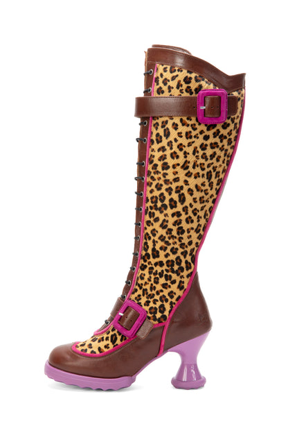 Knee-high boot with leopard print and pink buckle accents, high heel in pink. Foot brown.