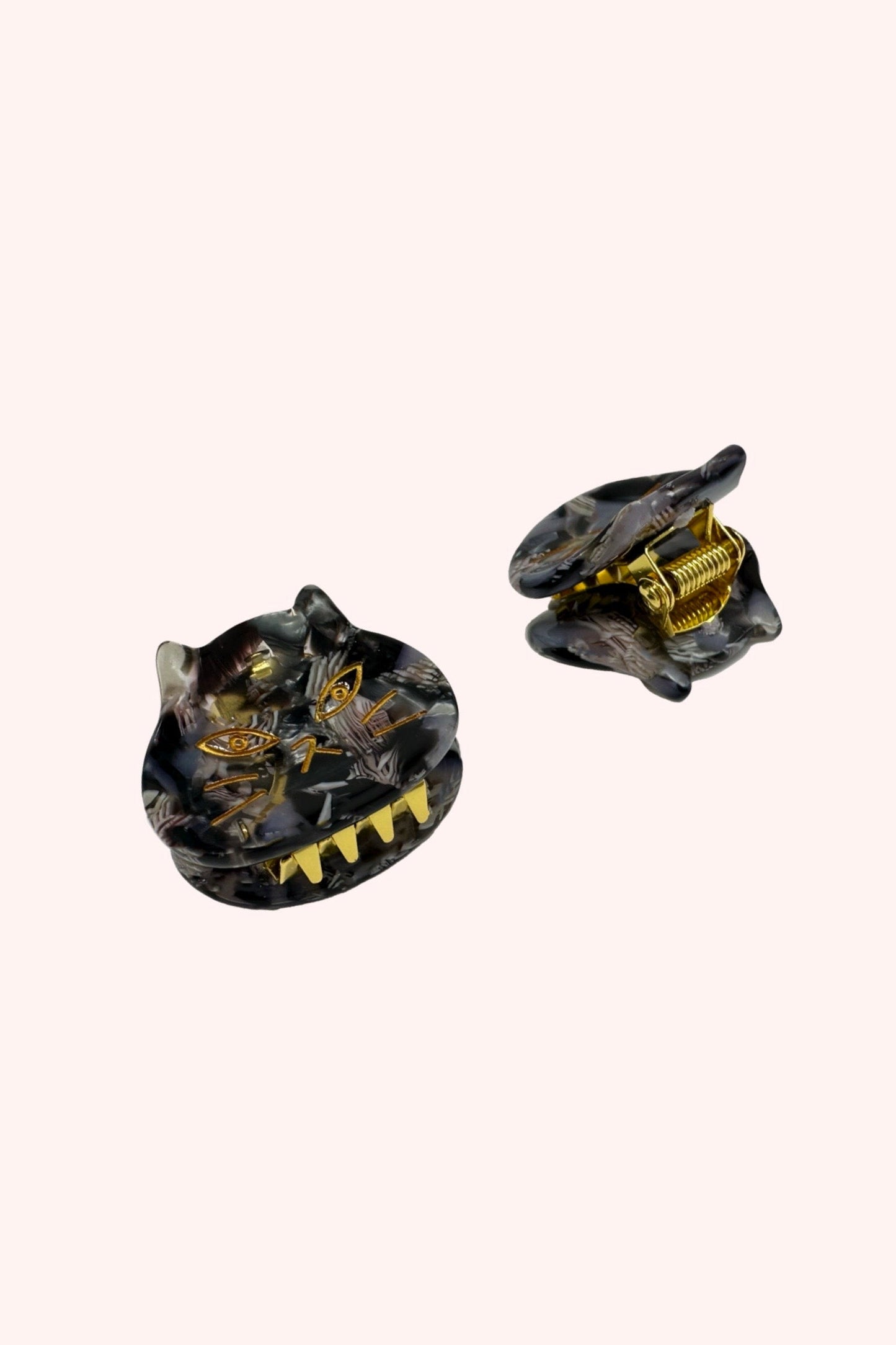 the Cat's Meow Jaw Clip Pair, Black, cat head on a golden jaw clip to add some fun to your hairstyle