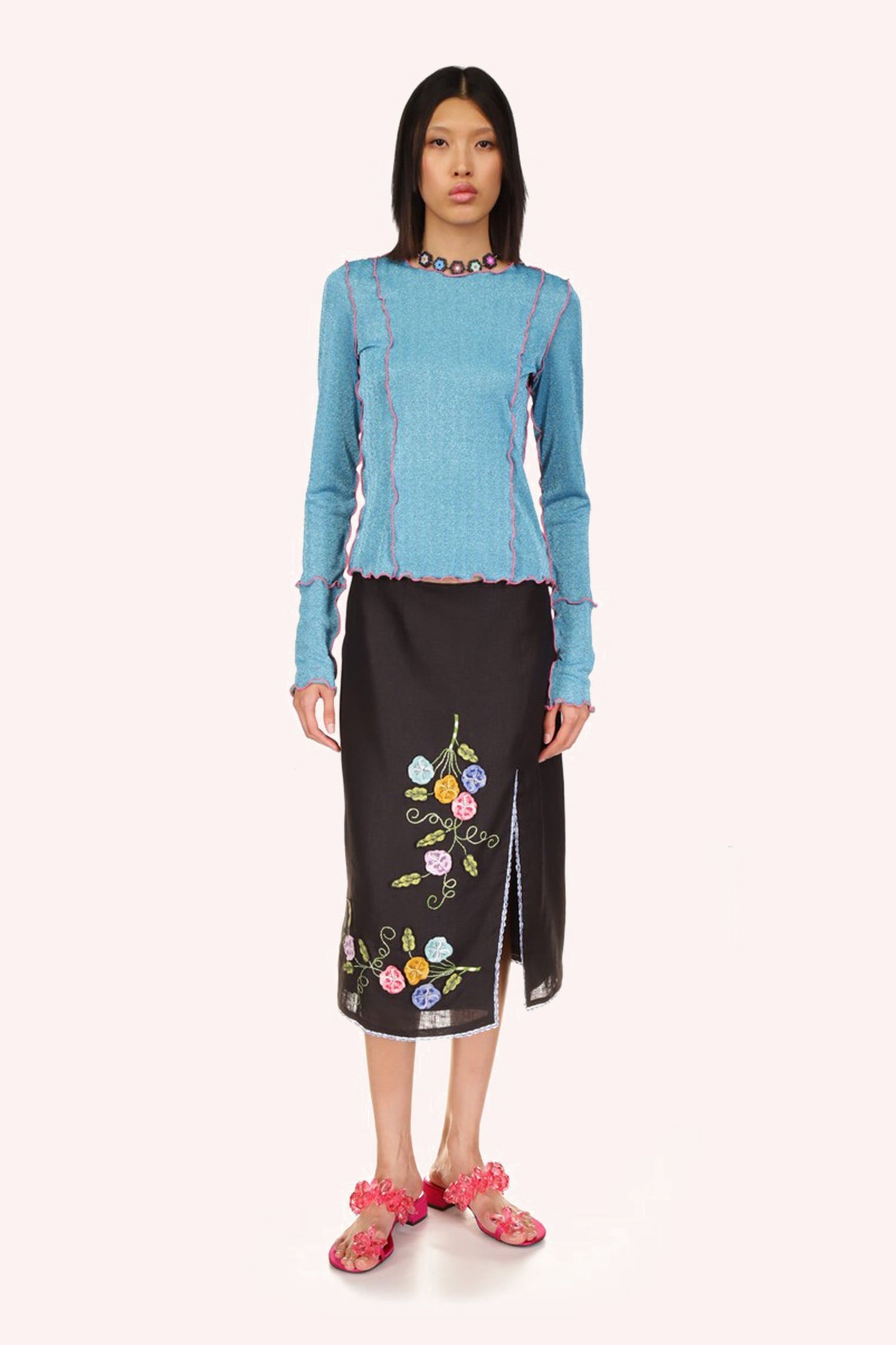 3-D Pansy Embroidered on Linen Skirt black Skirt with blue hems and the left side slit