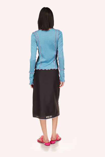 Baby blue hems on black fabric give the dress a playful & feminine look