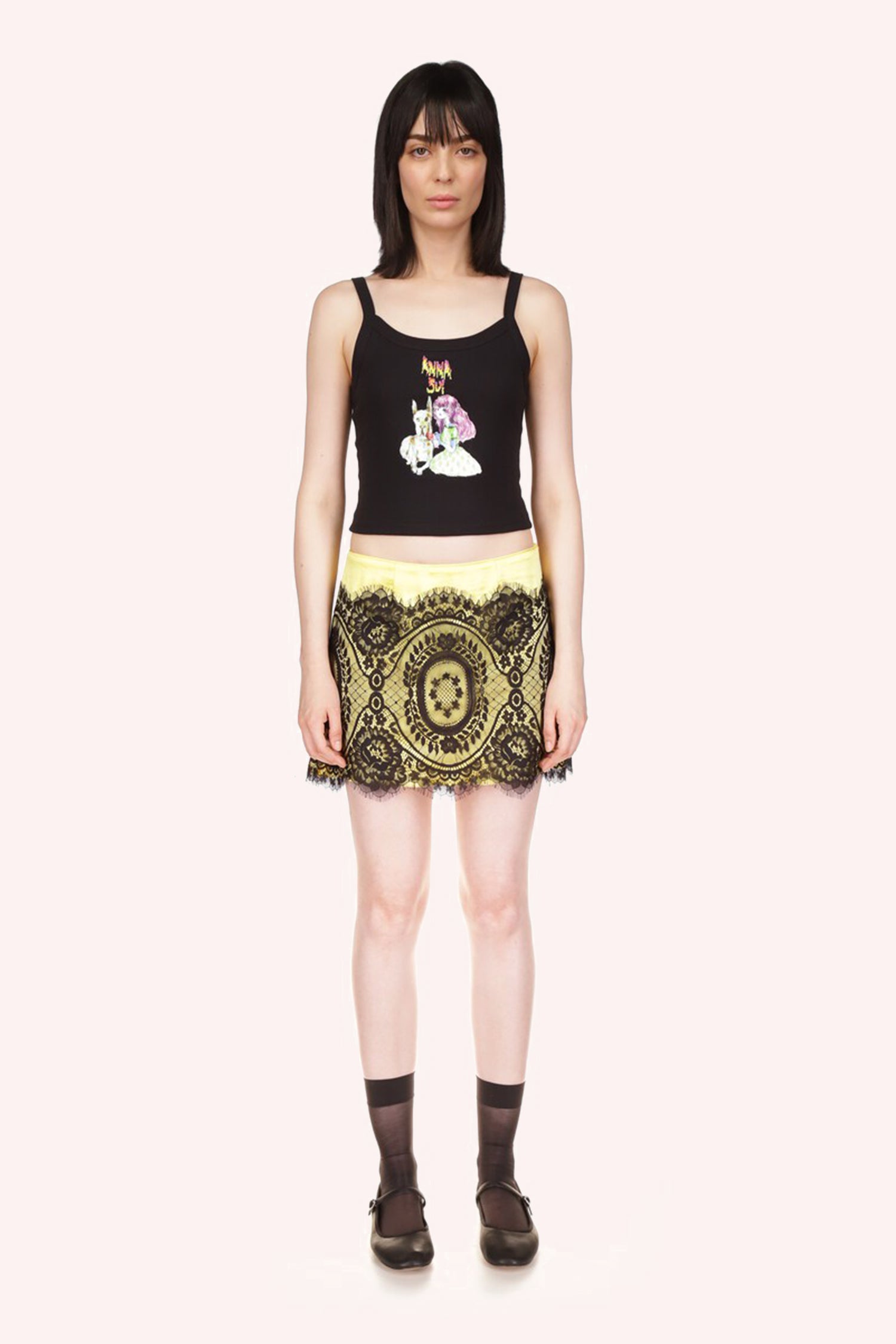 Tank Black, sleeveless Anna Sui logo above a little girl with pink hair and a large white dog