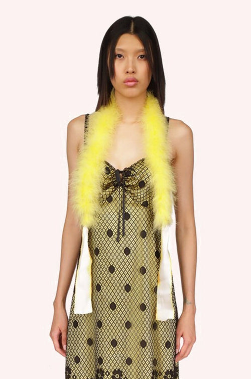 Marabou Boas Canary Yellow is a fake fur boa scarf that goes around the neck and down to the waist