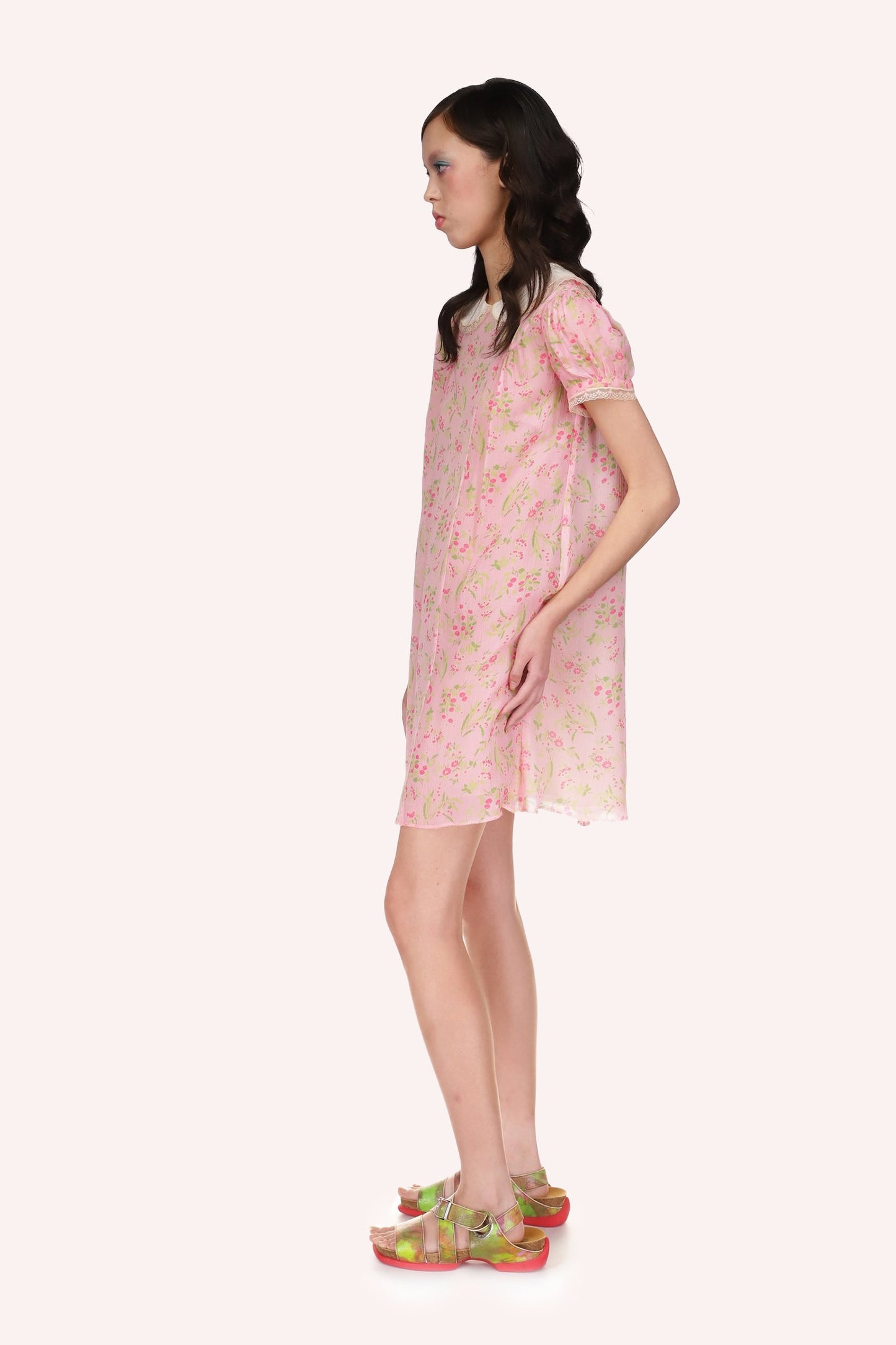 Babydoll Dress baby pink with floral pattern, mid-thigh, small sleeves, white collar over shoulders