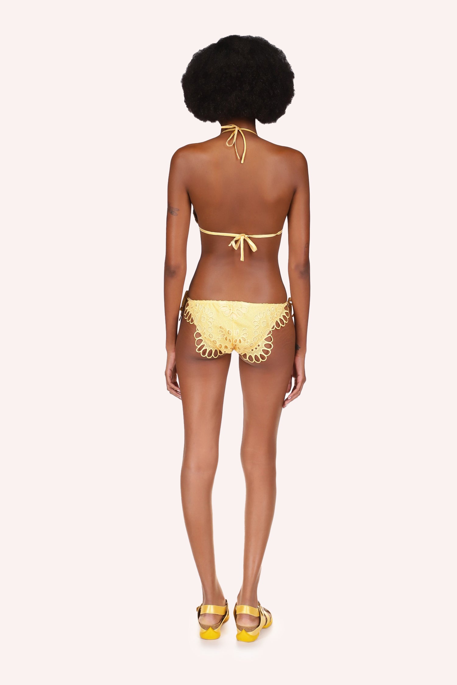 The Panty hems are highlighted with eyelet design, the fabric is also an eyelet yellow design