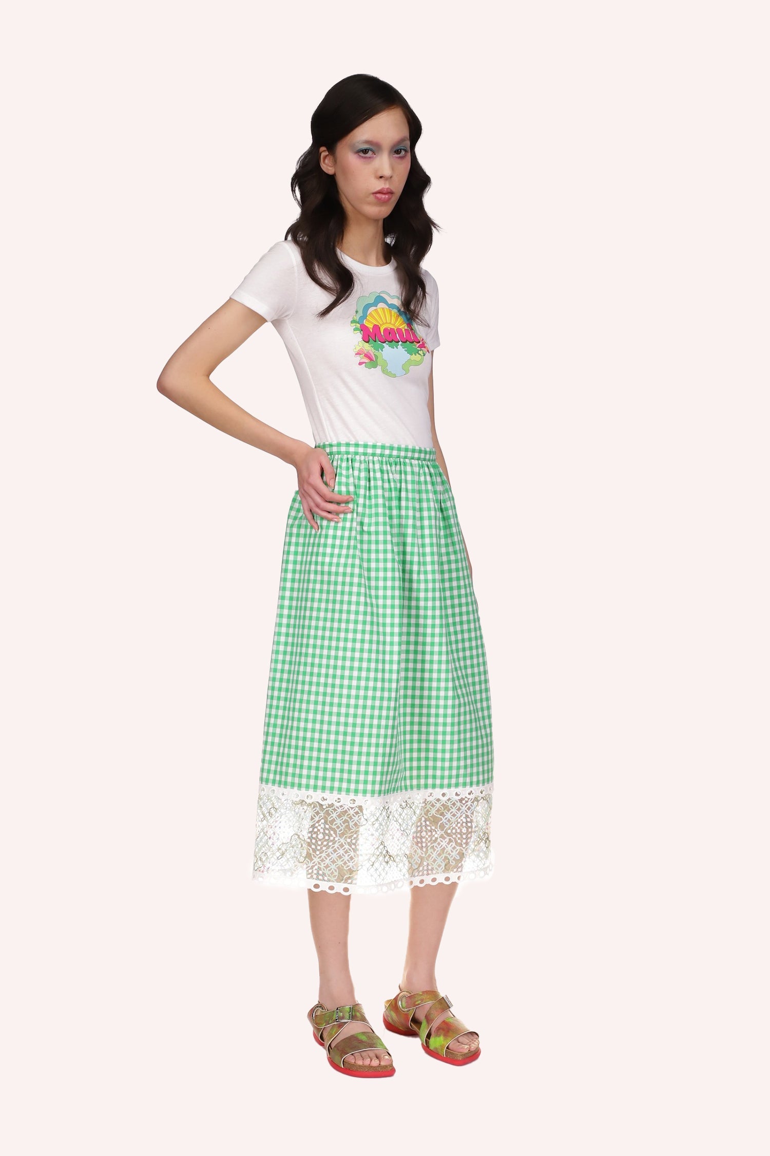 Gingham Skirt is fit at waist and larger from waist down, large see-thru lace at bottom hem