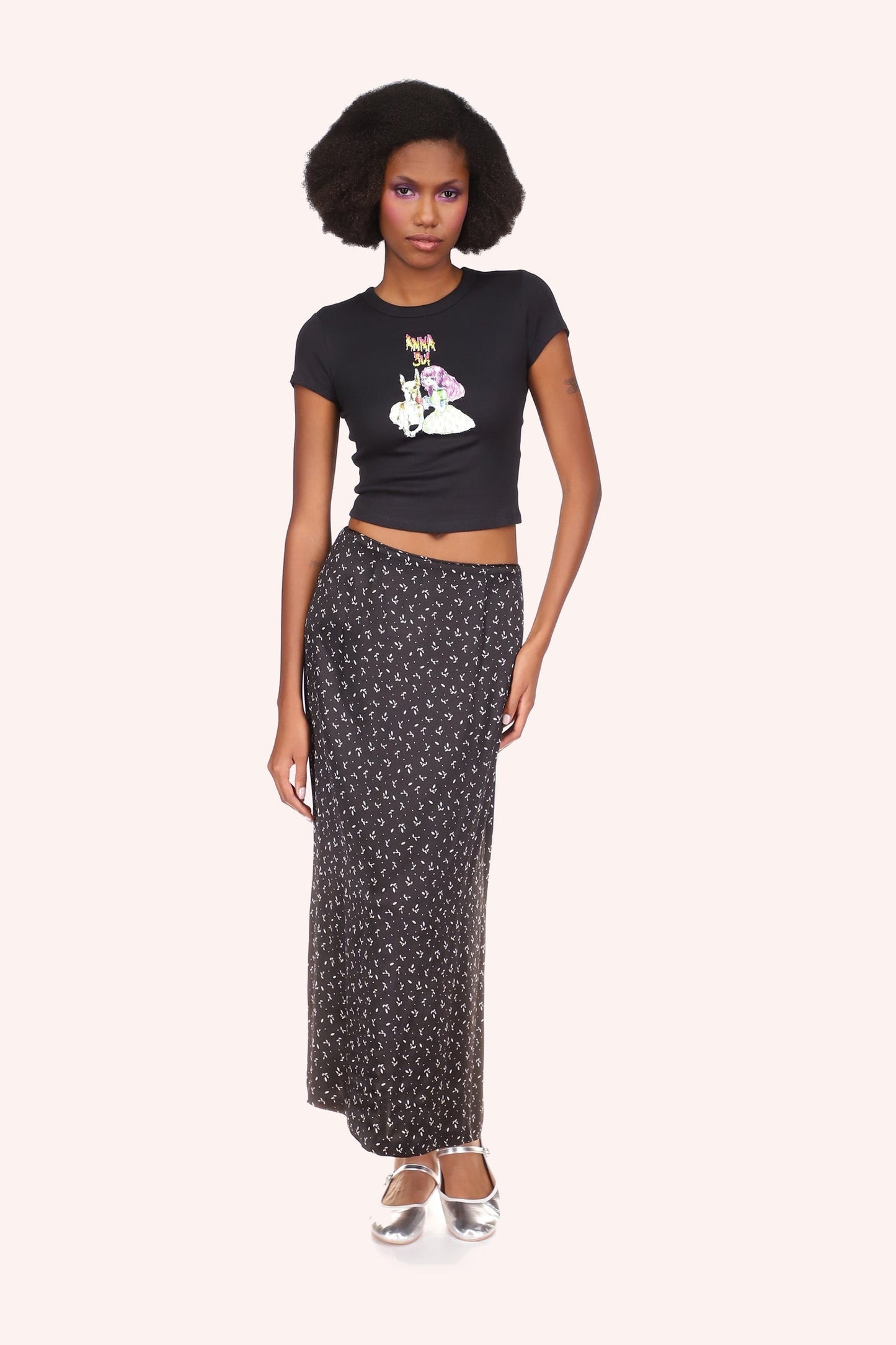 Micro Ribbed Baby Tee Black, Anna Sui logo above a stylized pink girl with a large white dog