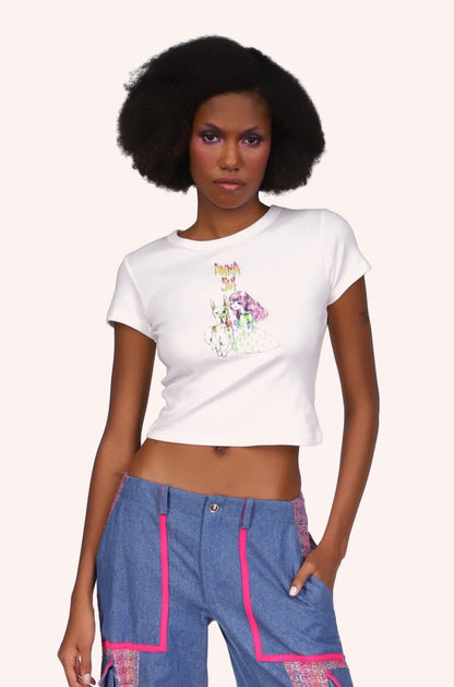 White tee, Short-sleeved, above the hips, A. S. logo above a stylized little girl with a large white dog