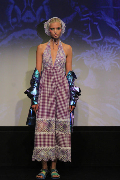 Gingham Halter Dress white and purple, sleeveless, ankles long, under the runway lights.