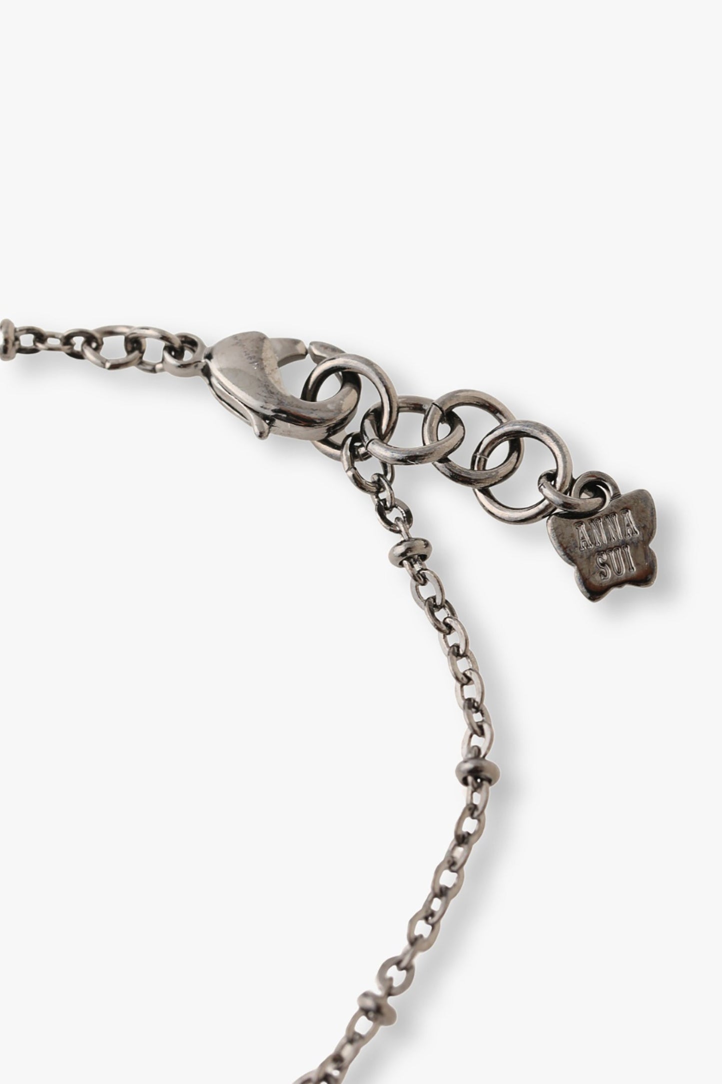 Gunmetal lobster claw clasp with large links for adjustability, Anna Sui imprint on a tag