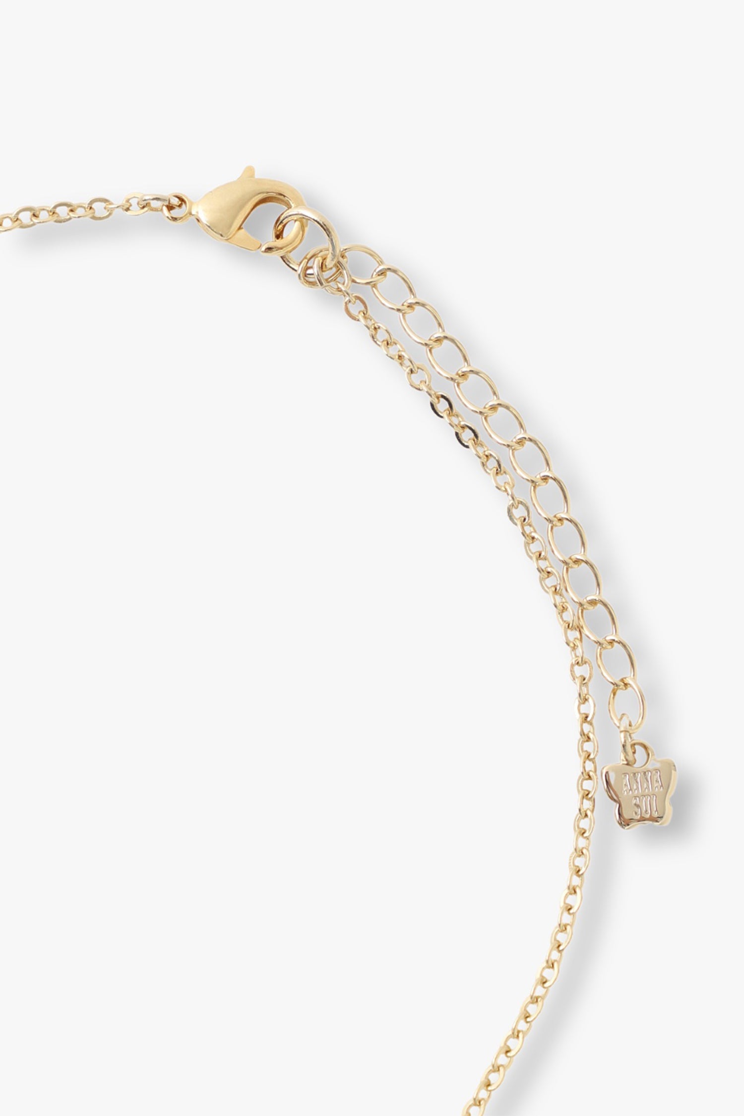 Gold color plating chain, a lobster claw, with large links for adjustability, Anna Sui imprint on a tag