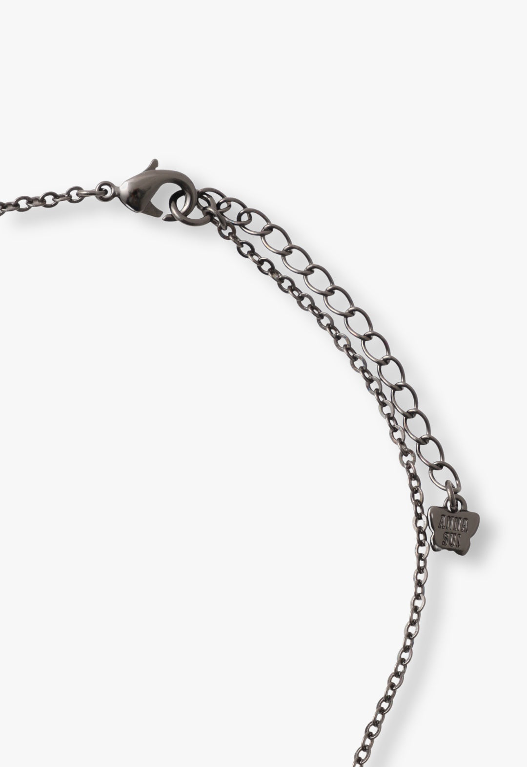 Gunmetal chain, lobster claw clasp lock, with Anna Sui imprint logo at the end
