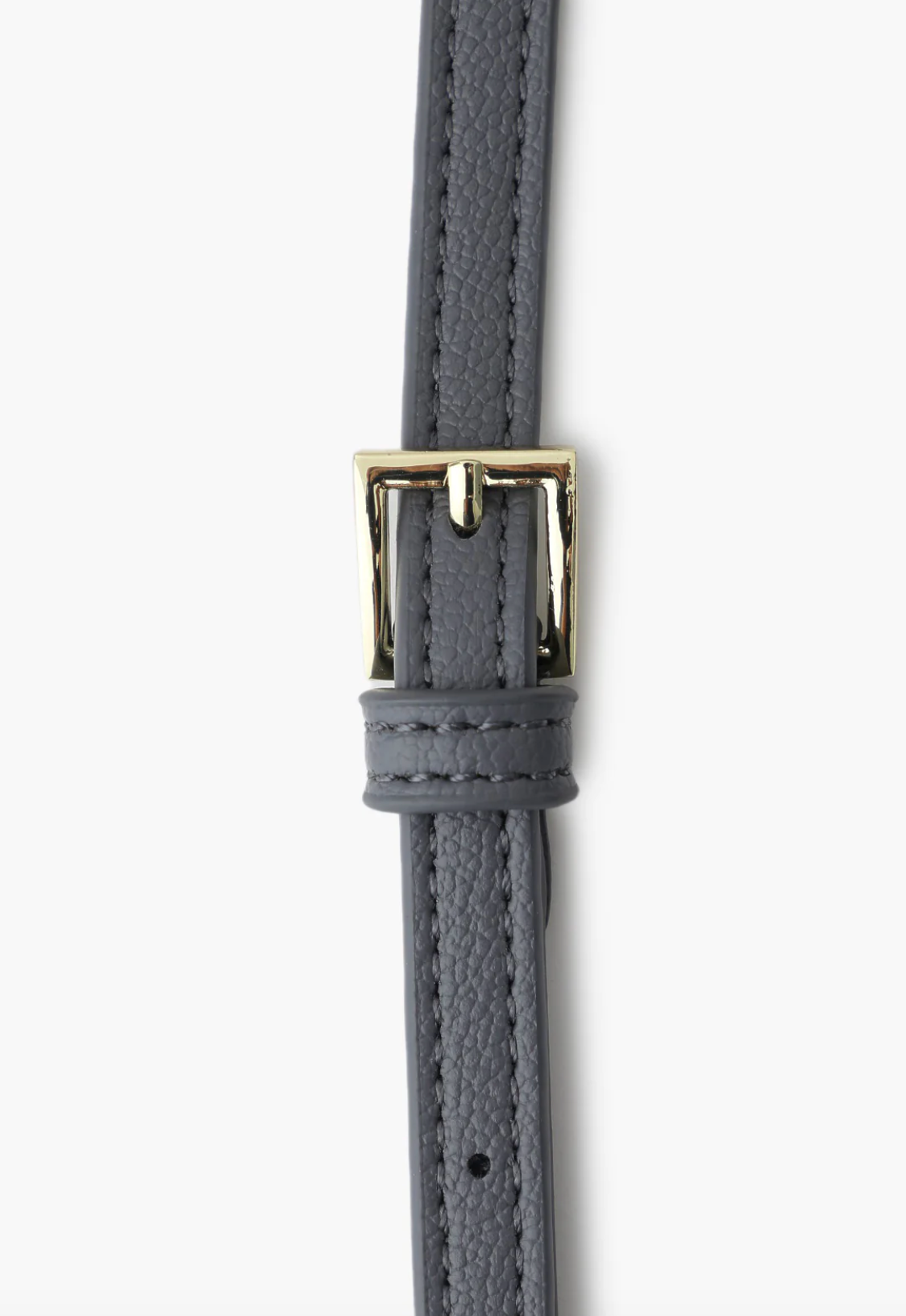The strap to this grey crossbody bag is with a golden metal buckle for adjustment