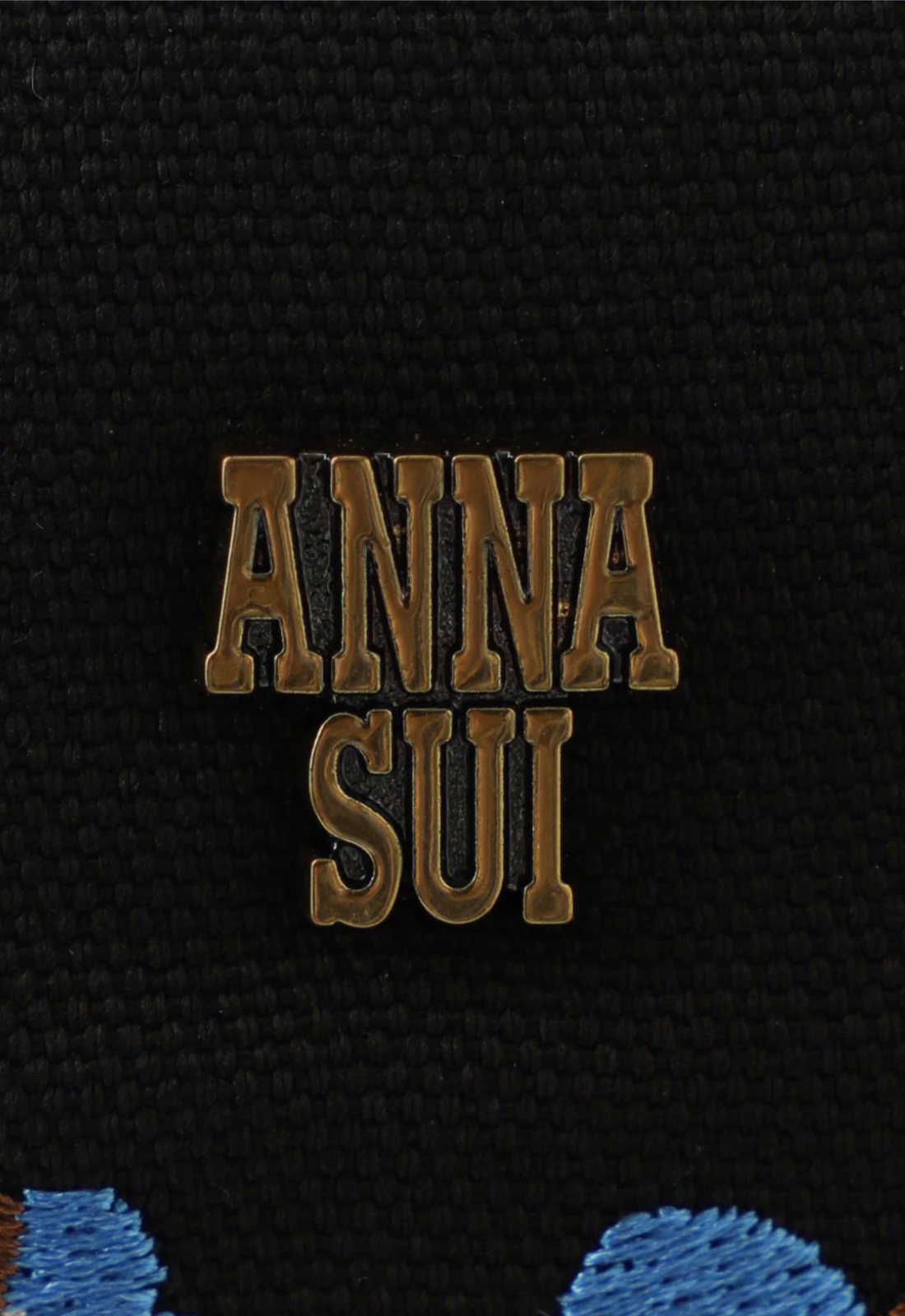 Peacock Tote Bag back with Anna Sui's artist label in golden font 