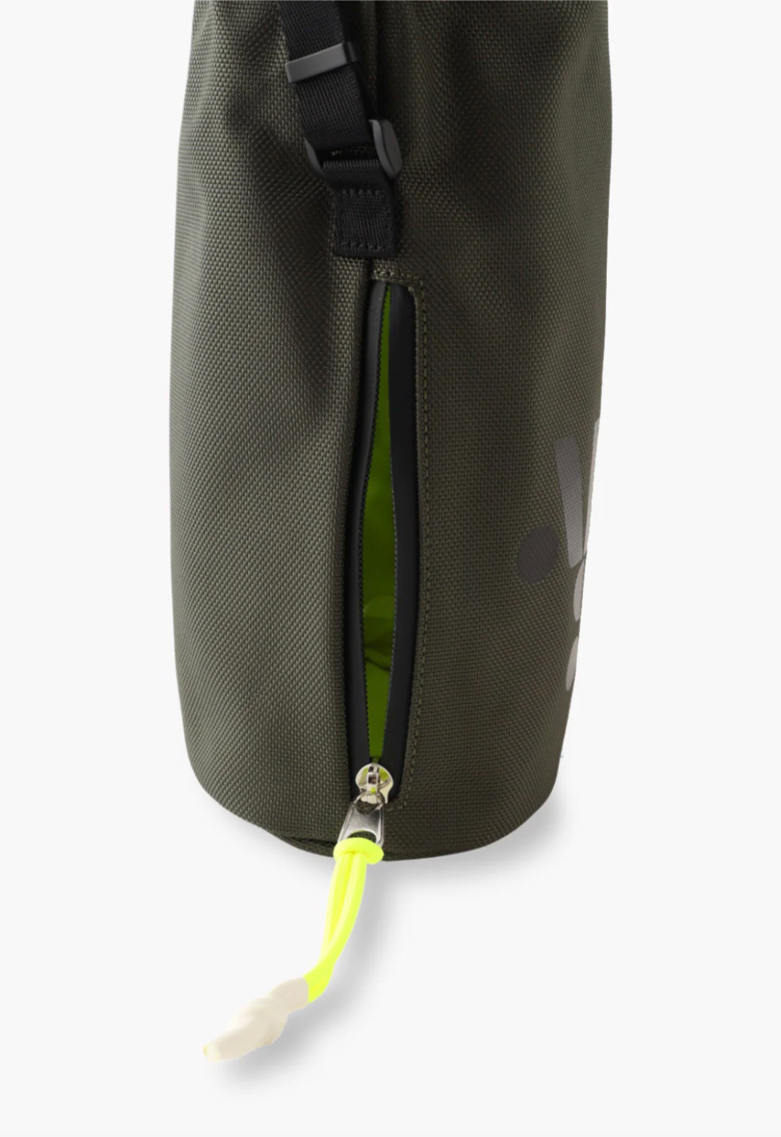 The Anyone Bucket Bag, under strap attach, a zipper pocket to reach inside
