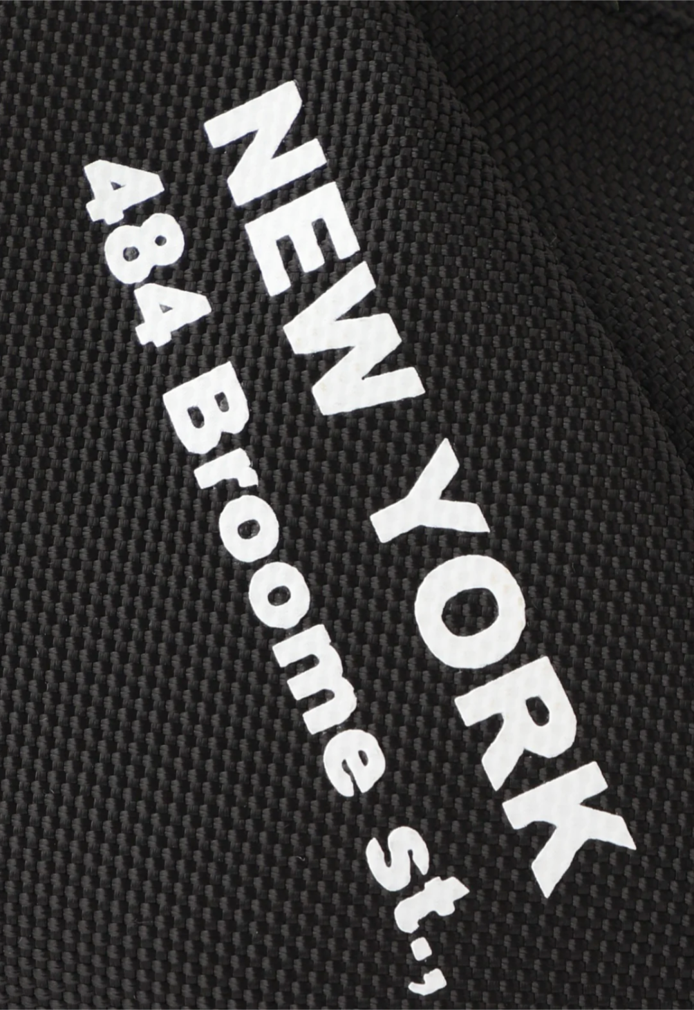 The Anyone Fanny Pack, detail on bottom of “NY 484 Broome sf.” In white fonts