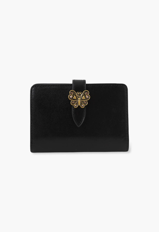 Small Roger Wallet black leather finishes, signature Anna Sui butterfly hardware on wallet flap