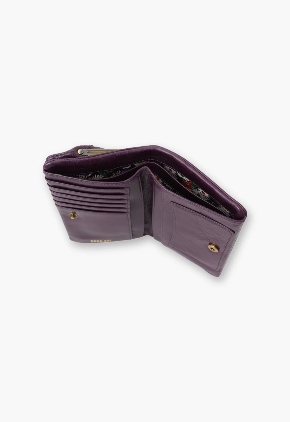 Wallet purple, 7 card slots, 4 open pockets, 2 divided bill slots and 1 front pouch, Snap buttons