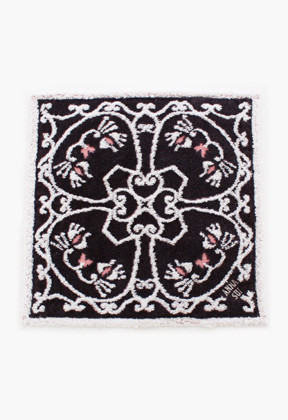 Cat Pattern Washcloth in black, 4 white/pink cat patterns in clover frame, Anna Sui' label in corner 