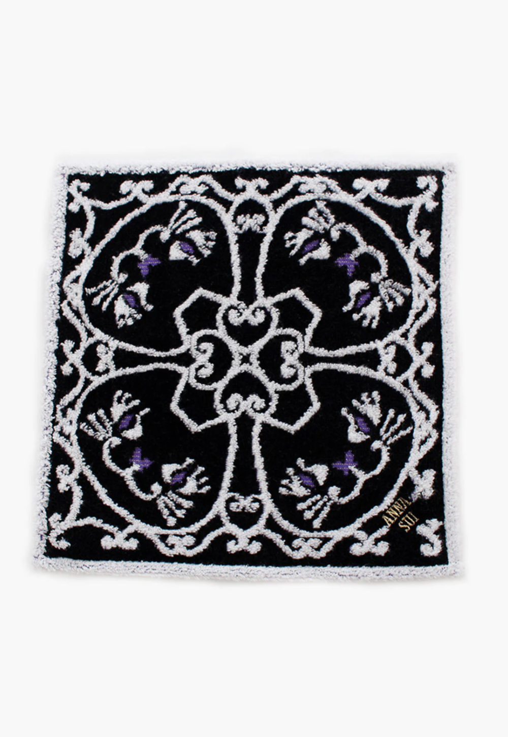 Cat Pattern Washcloth in black, 4 white/purple cat in a clover frame,  Anna Sui's label in corner 