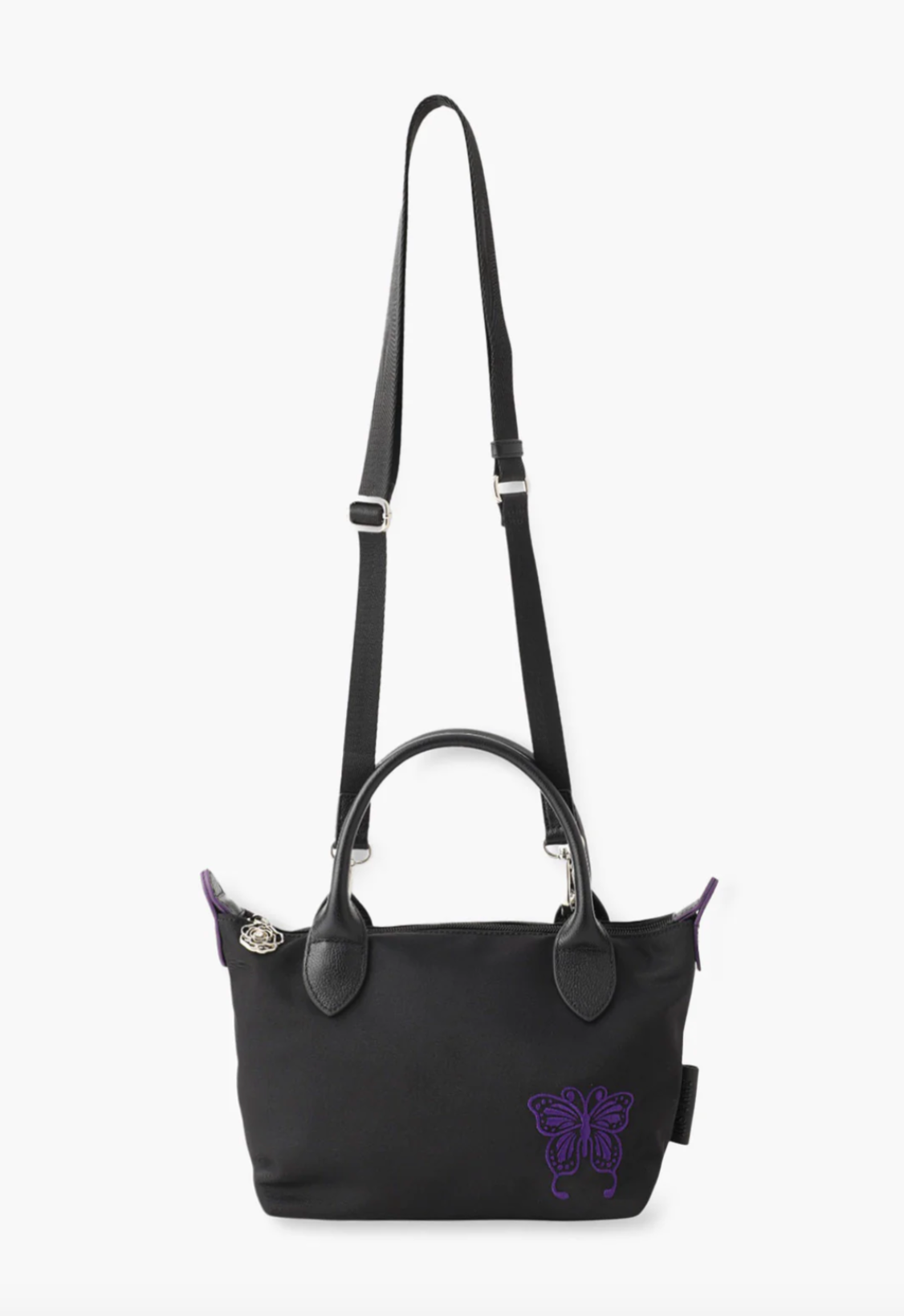 Small Voyage Tote in black, zipper rose with a gemstone pull tab, long over shoulder straps
