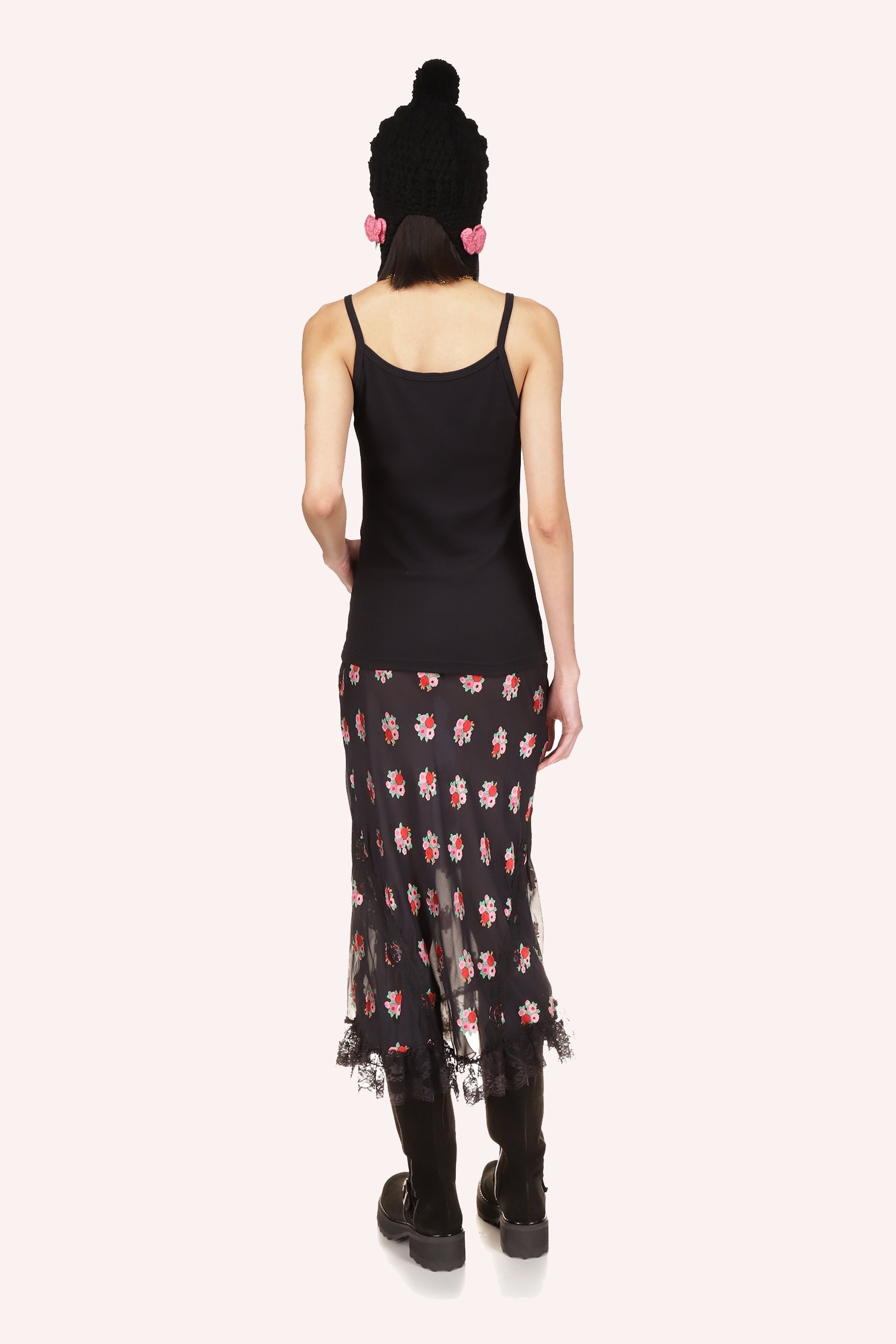 Skirt Black, under knee long, see-through from hips down, black lace at bottom, pattern of pink and red Rosie posies