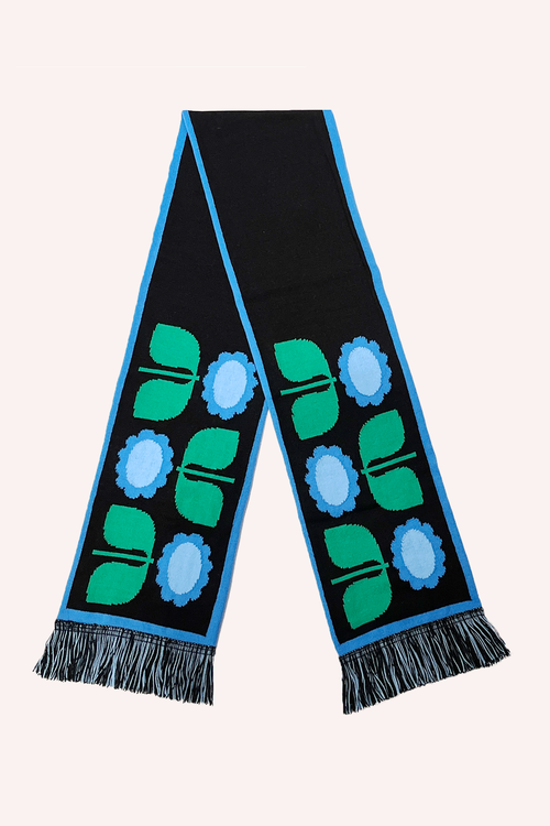 Black Scarf, with a light blue hem, 3 stylized daisies alternating on each end, in 2 shades of blue, green stem